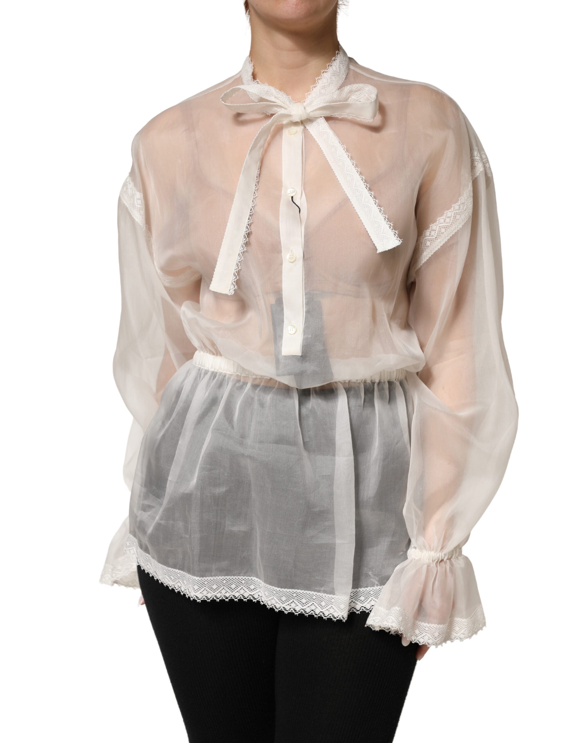 Blouse en soie blanche transparente avec nœud en dentelle Dolce & Gabbana, haut élégant et féminin.