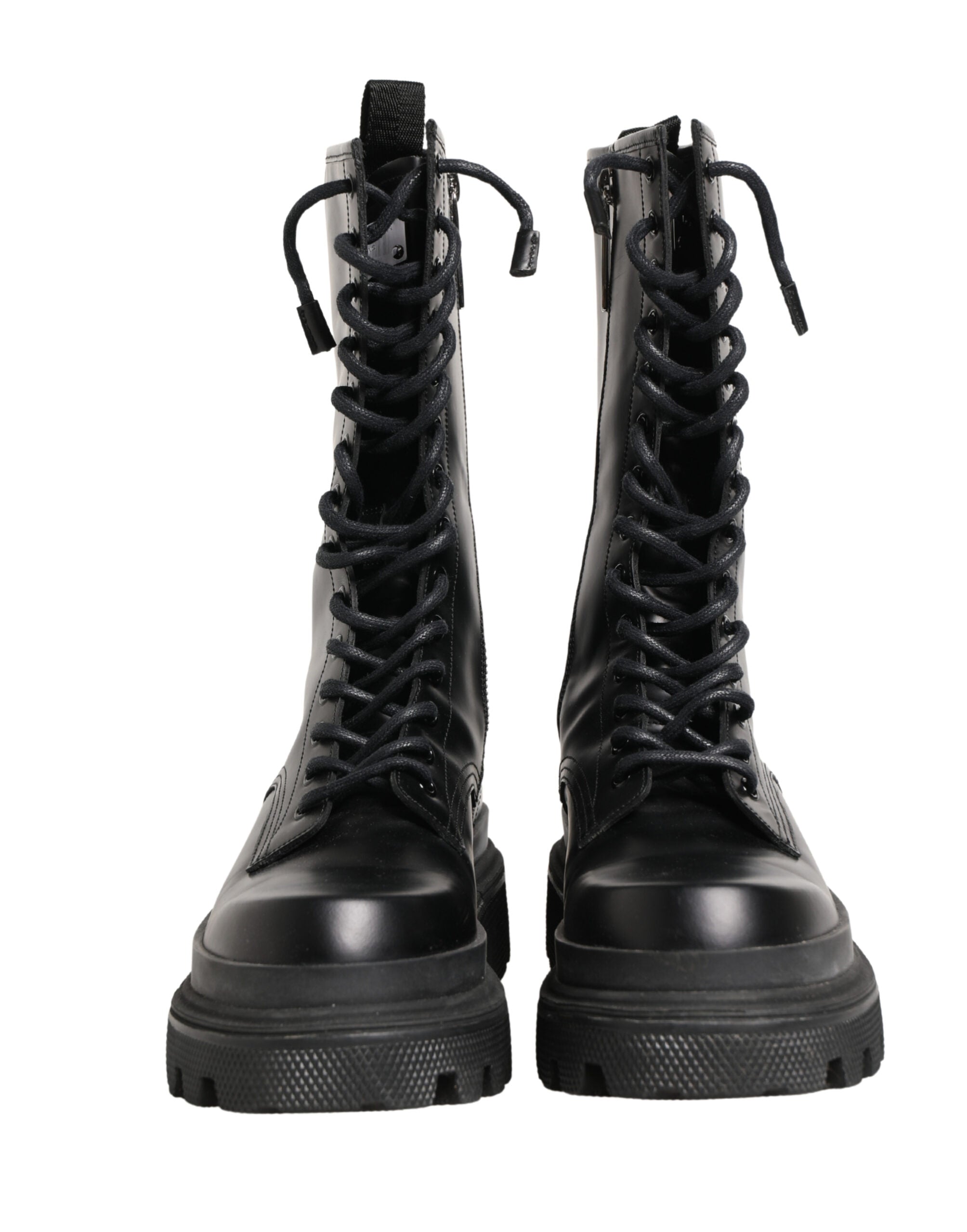 Bottes de combat en cuir noir Dolce & Gabbana avec semelle trekking, style robuste et tendance, vue de face.