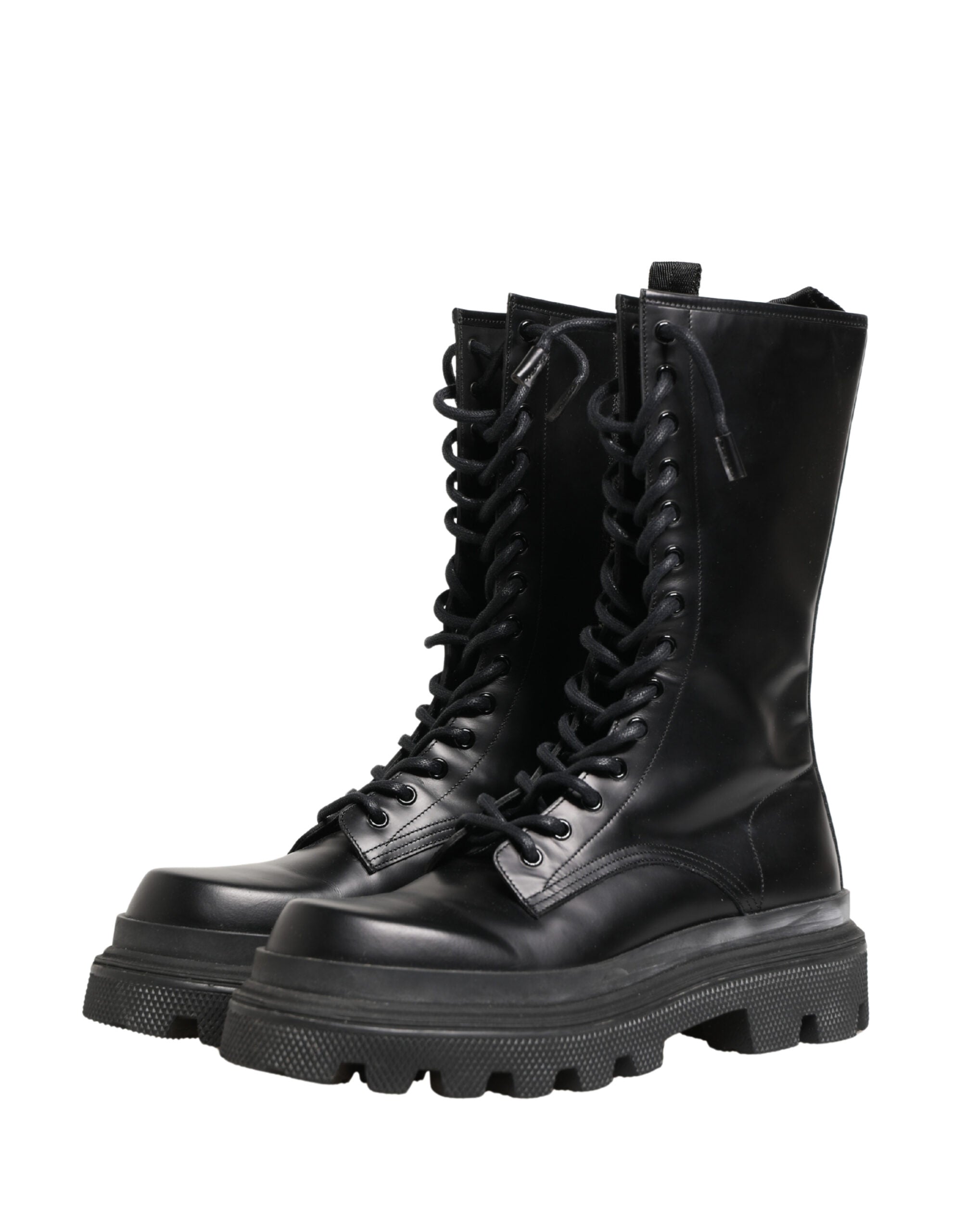 Bottes de combat en cuir noir Dolce & Gabbana avec semelle trekking, style robuste et élégant, vue de face.