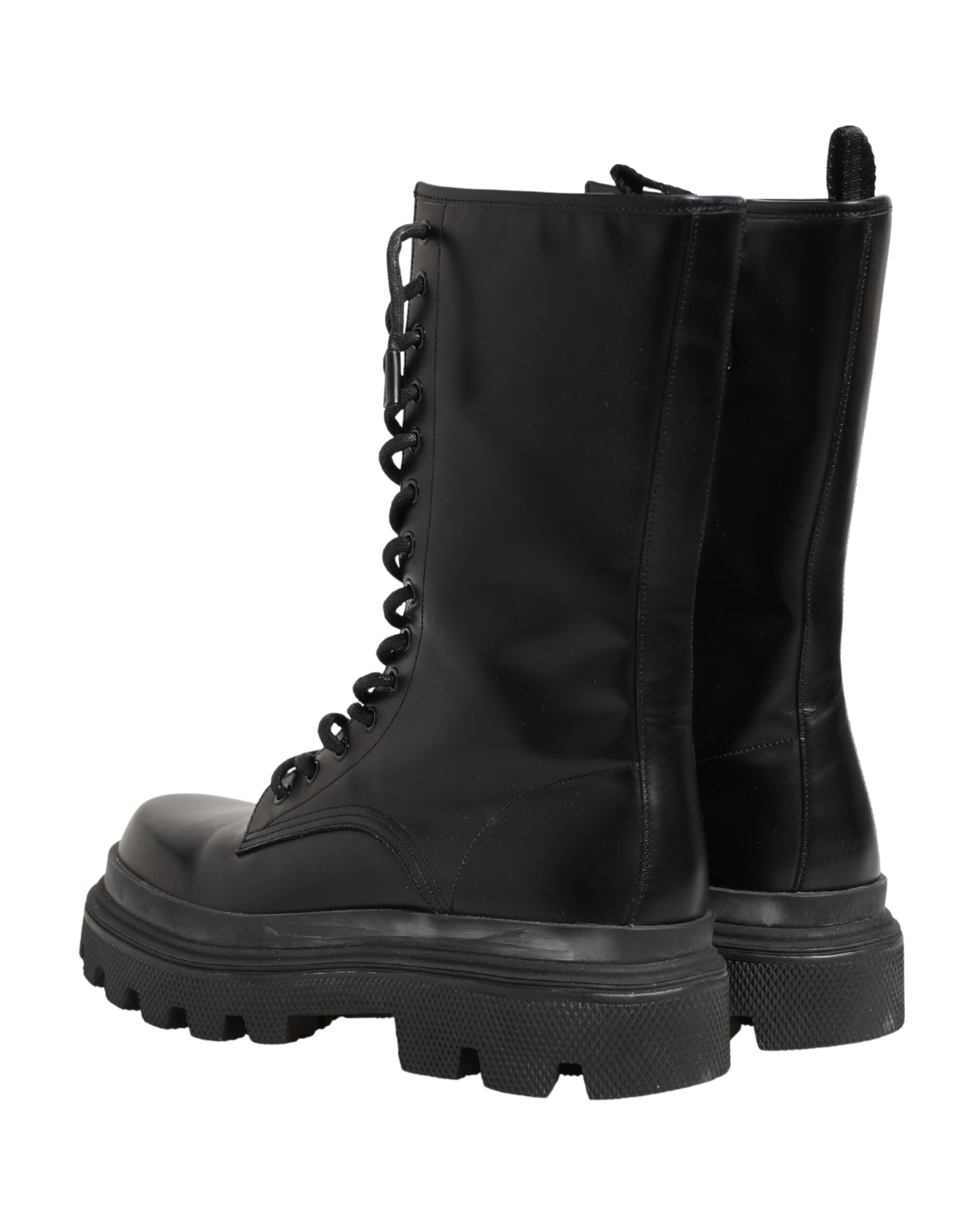 Bottes de combat en cuir noir Dolce & Gabbana avec semelle robuste, style tendance et détails de luxe.