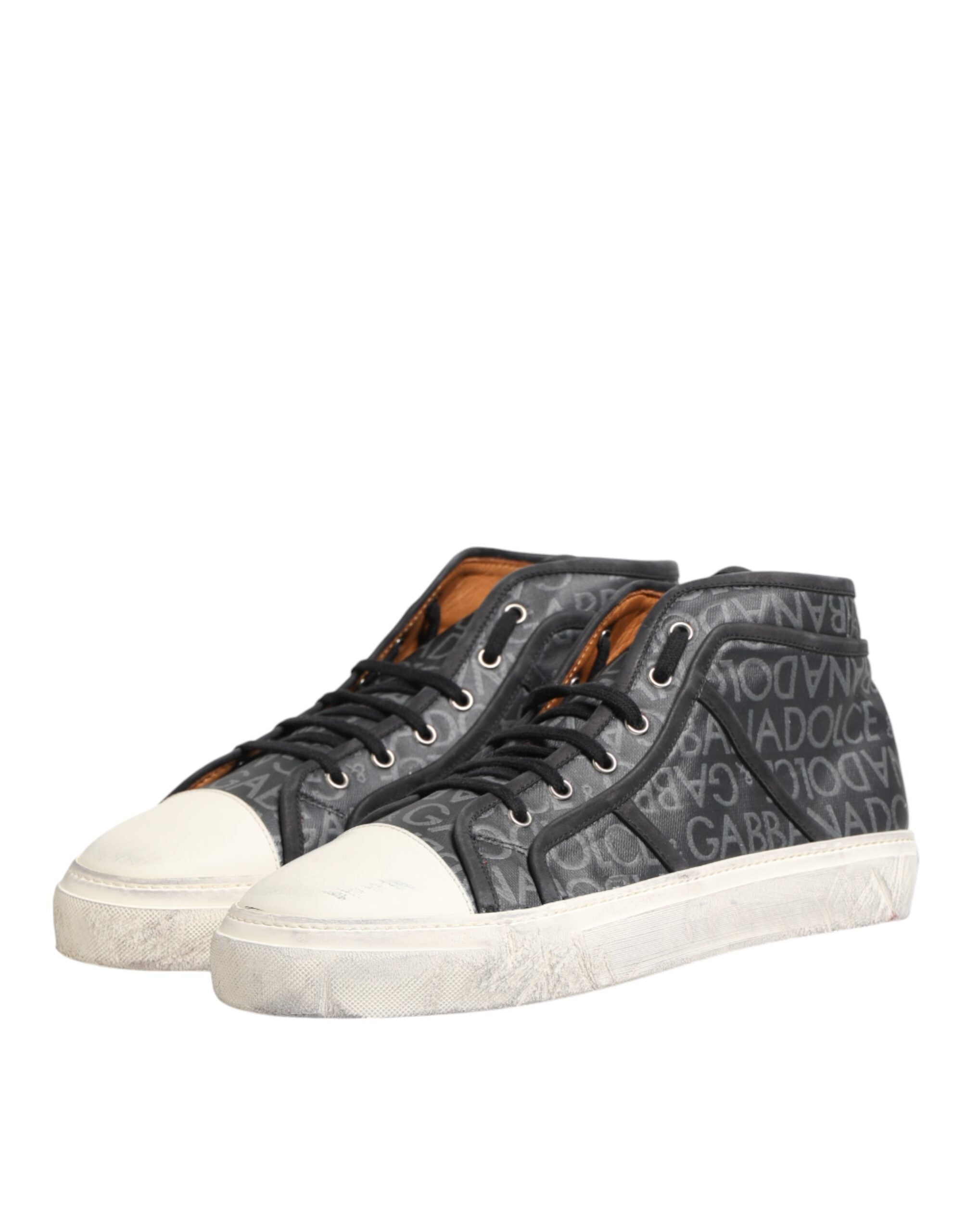 Chaussures sneakers Dolce & Gabbana en toile noire et blanche avec logo, baskets à mi-hauteur, style moderne et élégant.