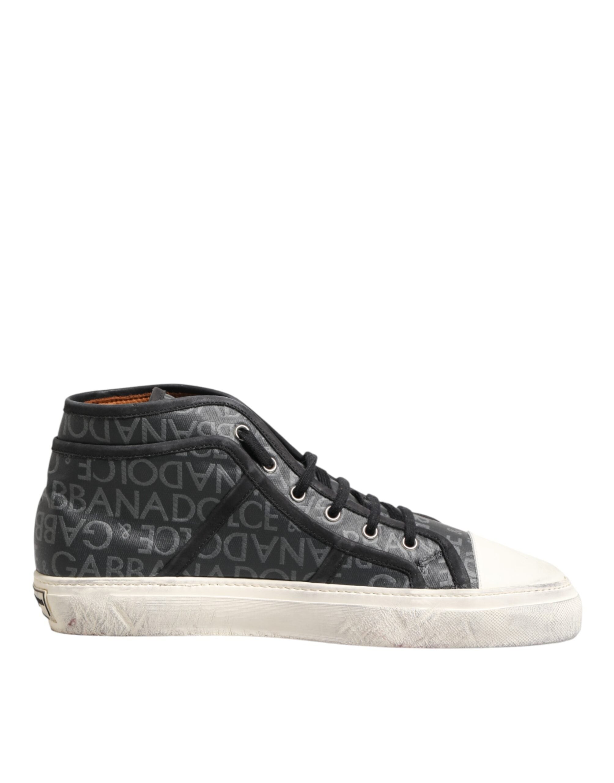 Sneakers Dolce & Gabbana en toile noire et blanche, logo sur la tige, style mi-hauteur, chaussures de mode élégantes.