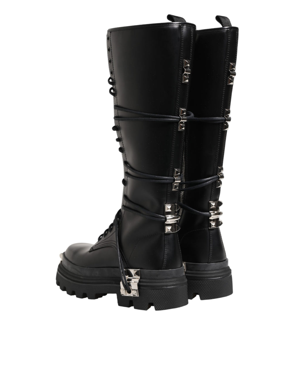 Bottes combat en cuir noir de hauteur genou de la marque Dolce & Gabbana, visibles avec détails en cuir et semelle robuste.