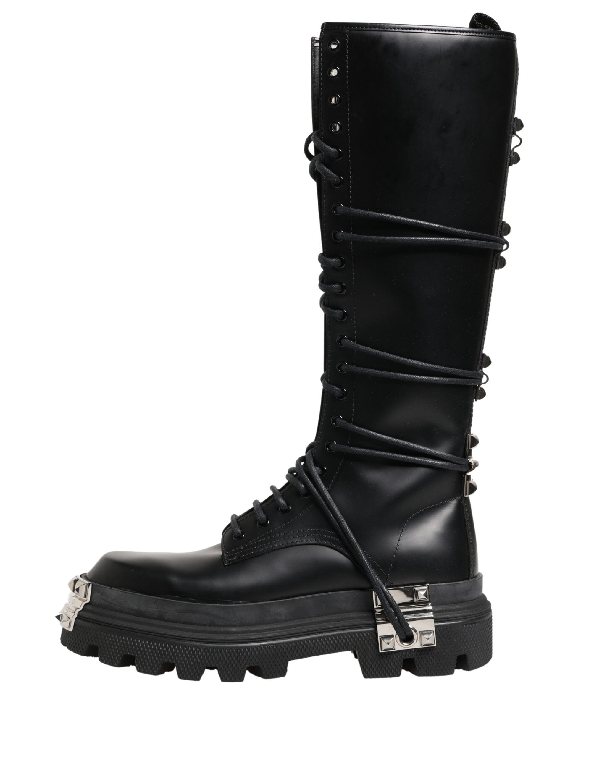 Bottes combat en cuir noir Dolce & Gabbana, hauteur genou, style robuste et élégant, vue de face.