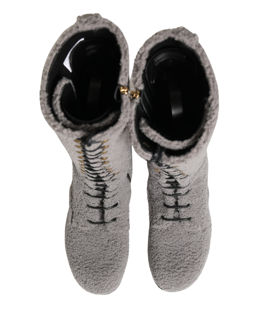 Bottes hautes en shearling gris de Dolce & Gabbana avec lacets, style élégant et confortable, pour femmes.
