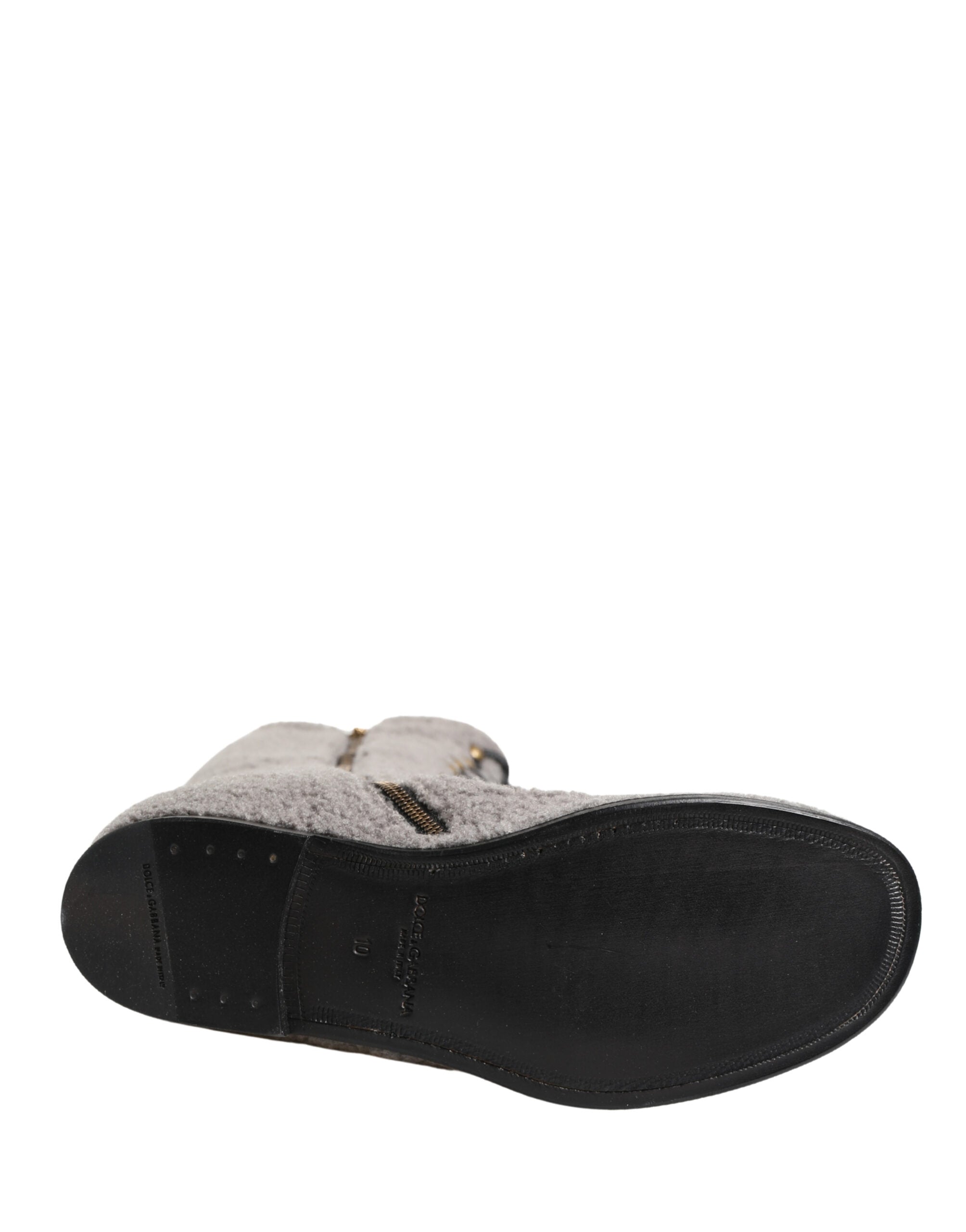 Bottes hautes en shearling gris de Dolce & Gabbana avec lacets, style élégant et confortable pour femmes.