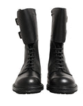 Bottes de combat en cuir noir Dolce & Gabbana avec boucle, style robuste et élégant, pour un look tendance et sophistiqué.