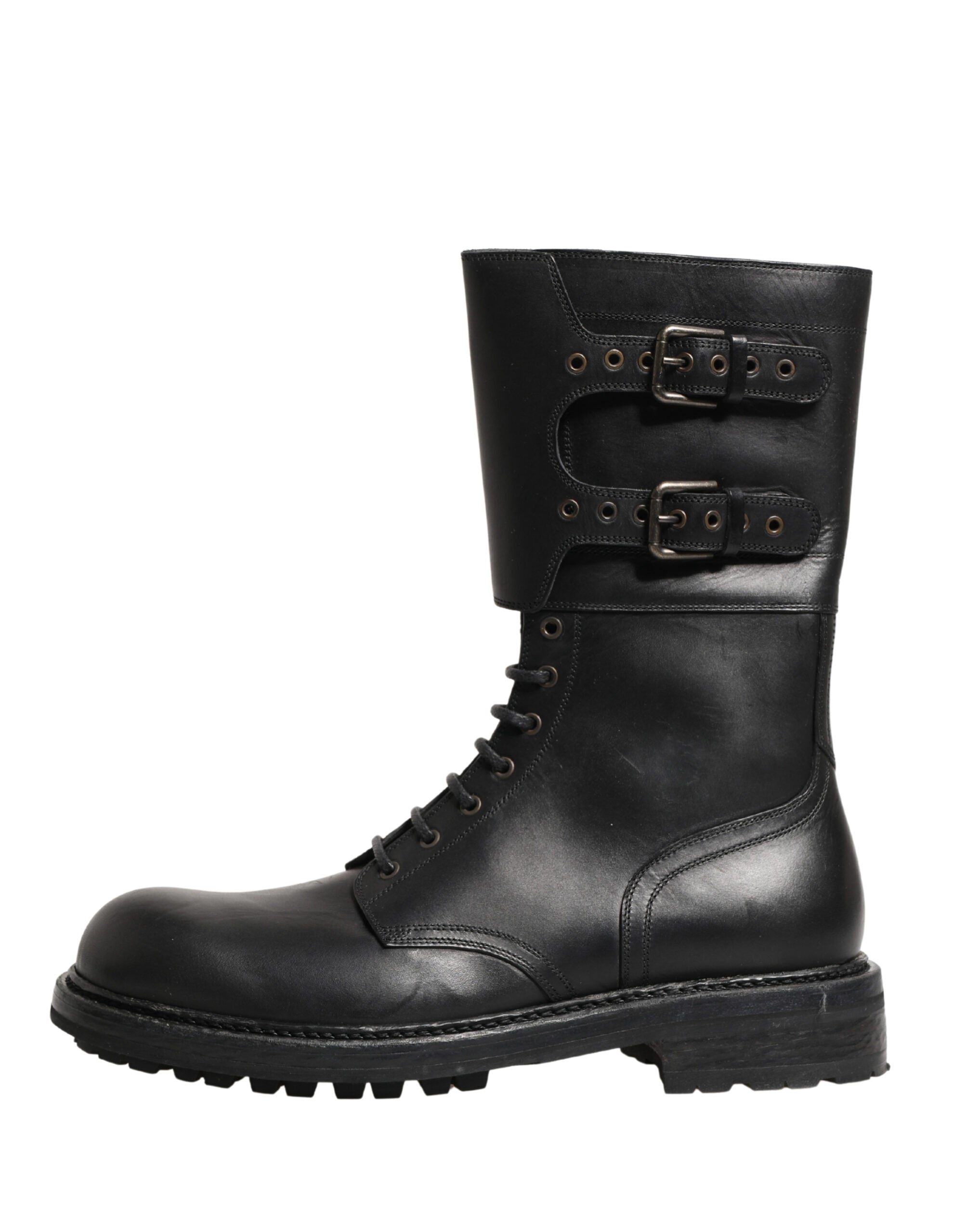 Bottes combat en cuir noir avec boucle, de la marque Dolce & Gabbana, chaussures élégantes et robustes pour un style urbain.