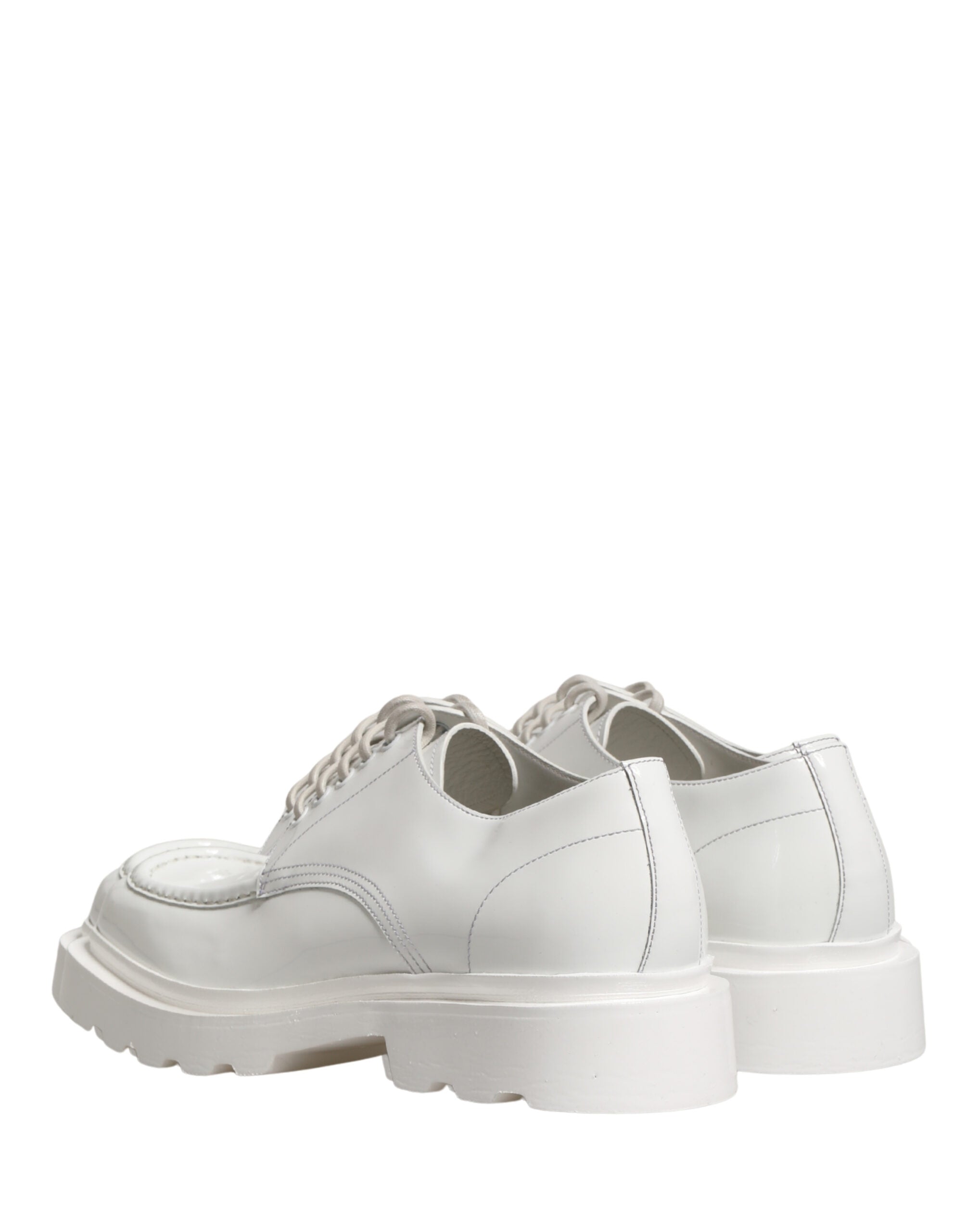 Chaussures Derby en cuir blanc à semelle épaisse de Dolce & Gabbana, style sophistiqué et moderne.