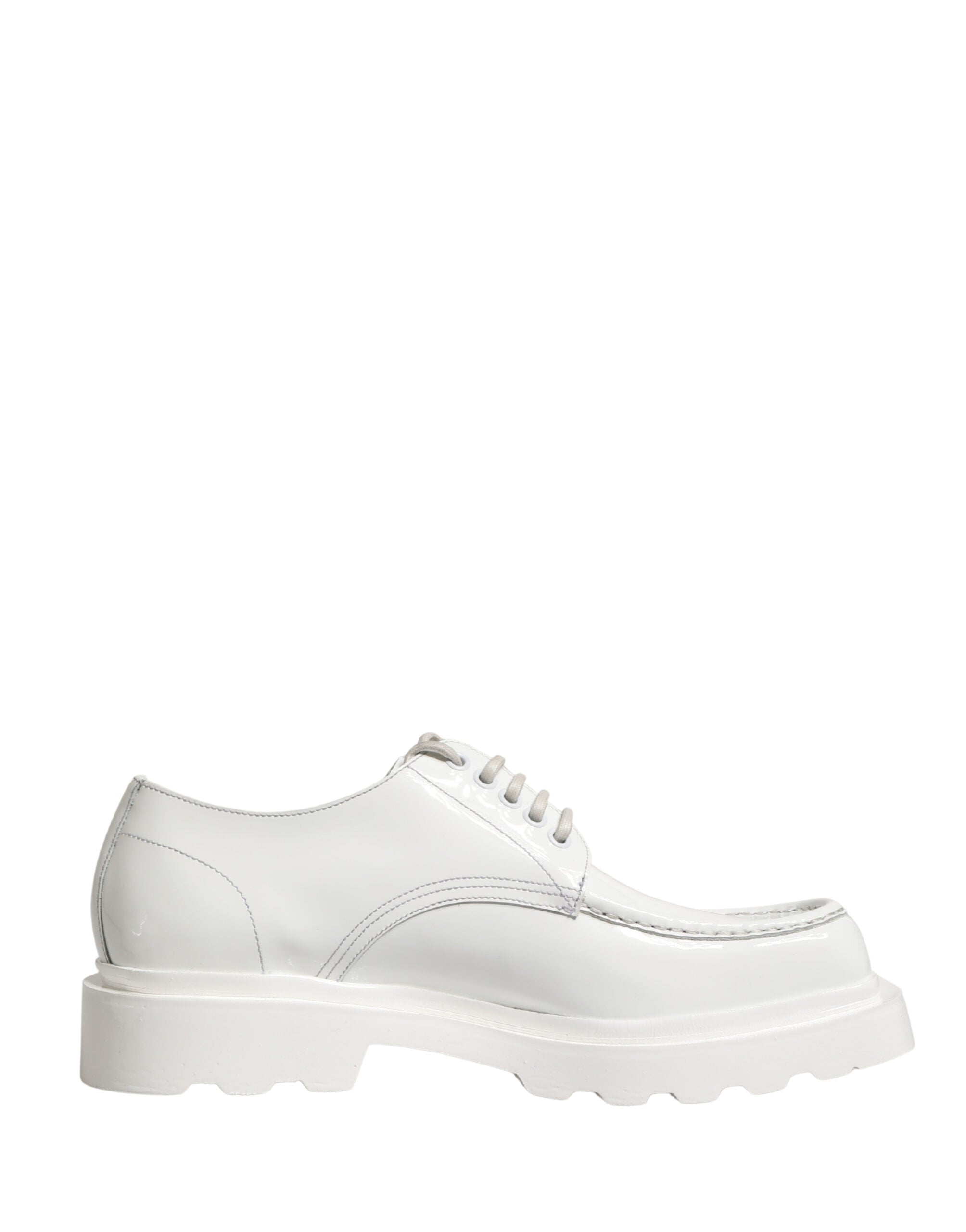 Chaussures Derby en cuir blanc Dolce & Gabbana avec semelle épaisse, style chunky, vue de face.