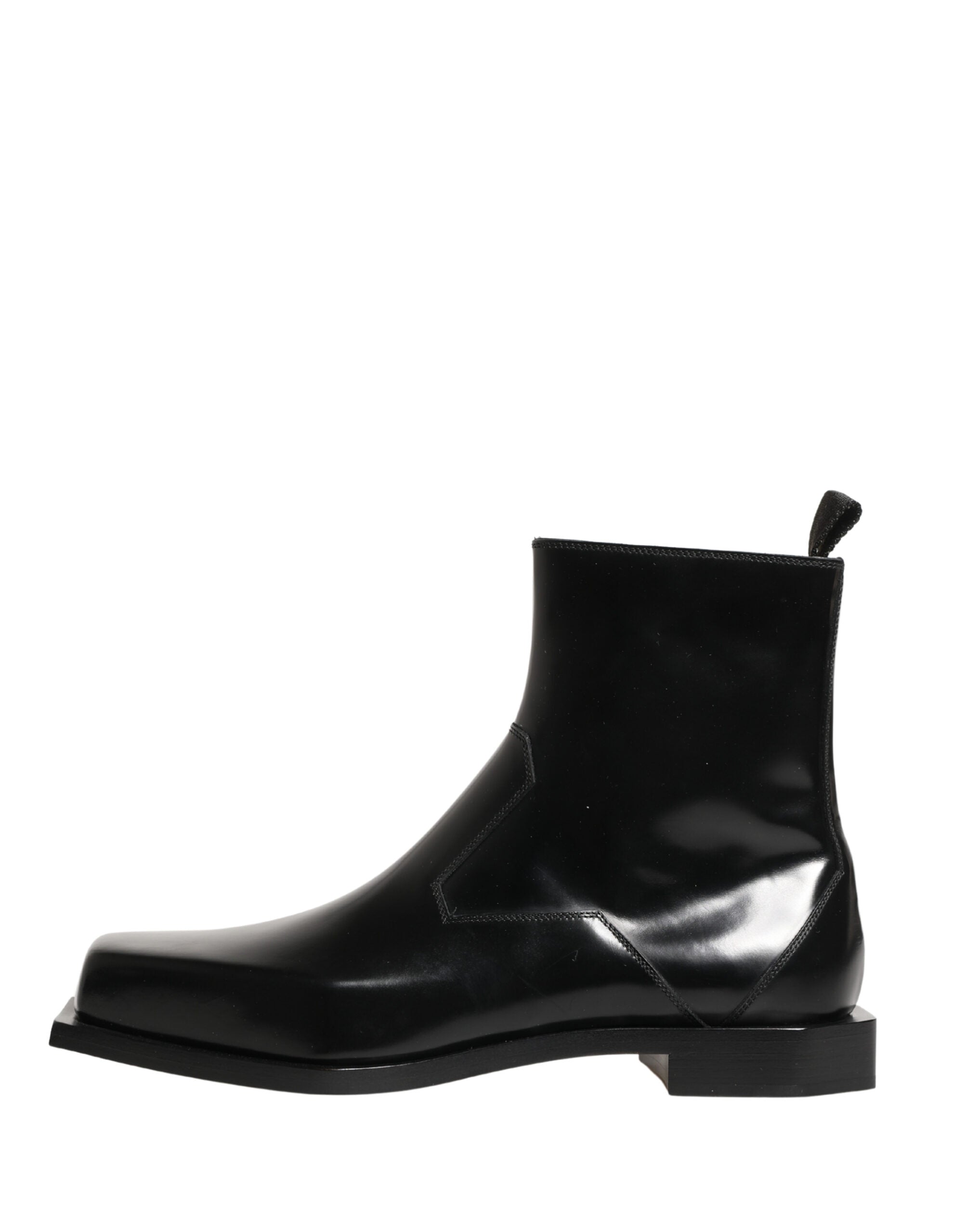 Bottines en cuir noir Dolce & Gabbana avec fermeture éclair, talon moyen et design élégant pour femme.