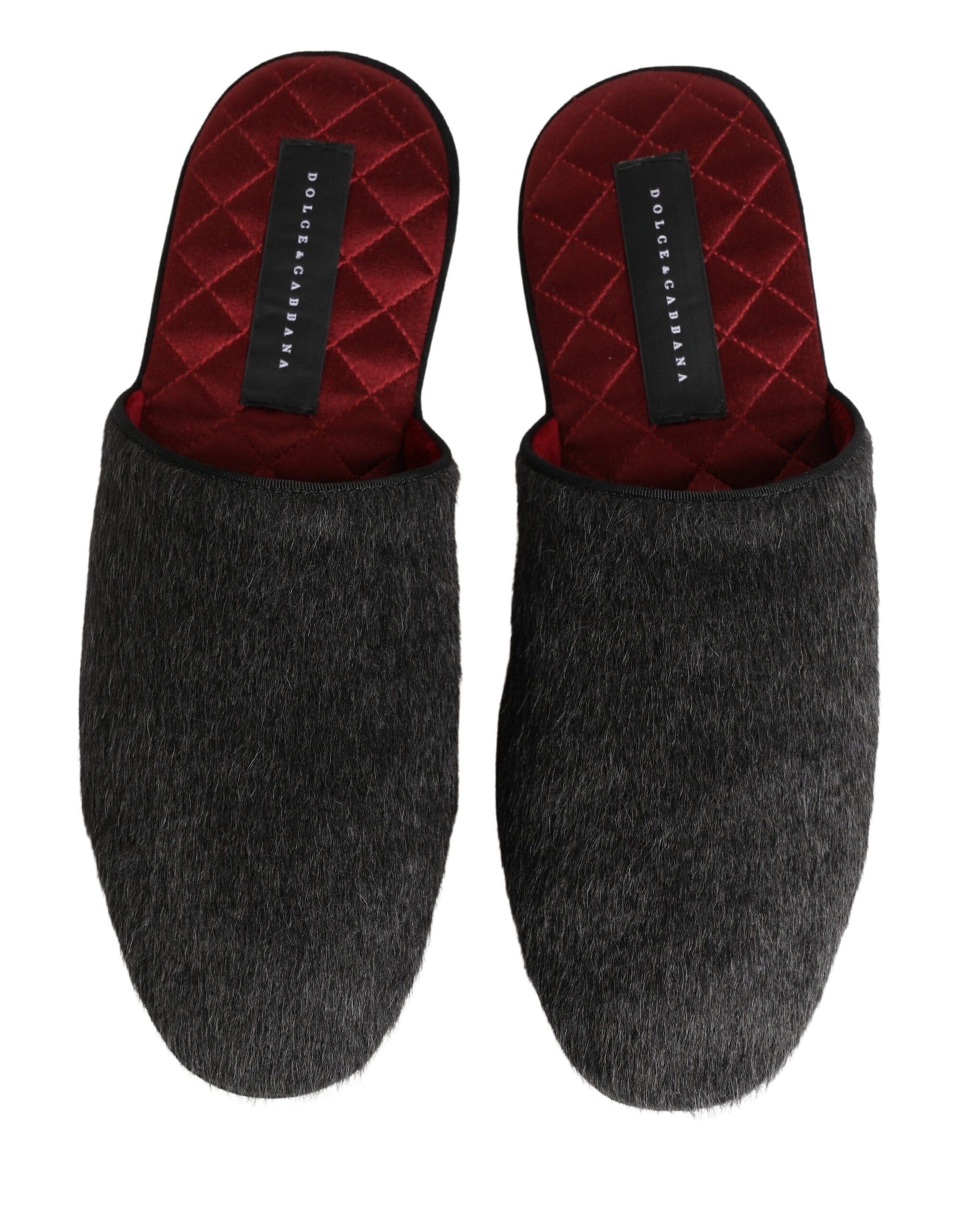 Chaussures slippers en laine gris foncé de Dolce & Gabbana, intérieur rouge, style élégant et confortable.