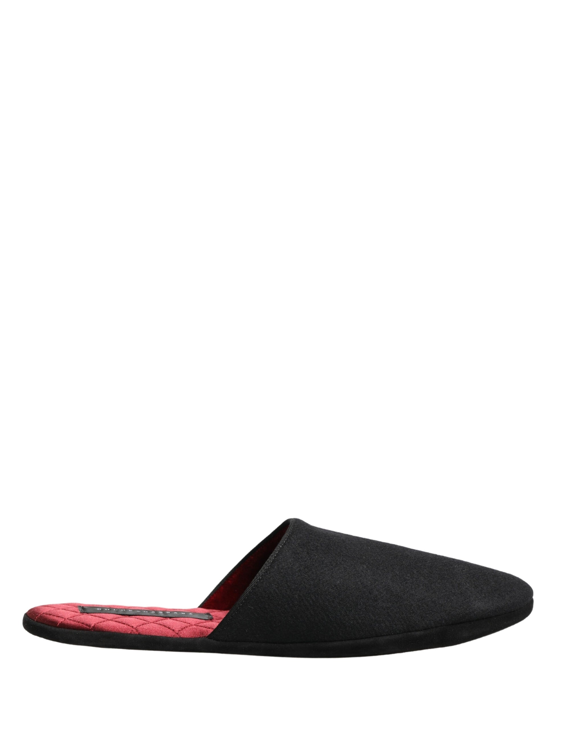 Chaussures slippers noires en laine et cachemire Dolce & Gabbana avec couture rouge quiltée, confortables et élégantes.