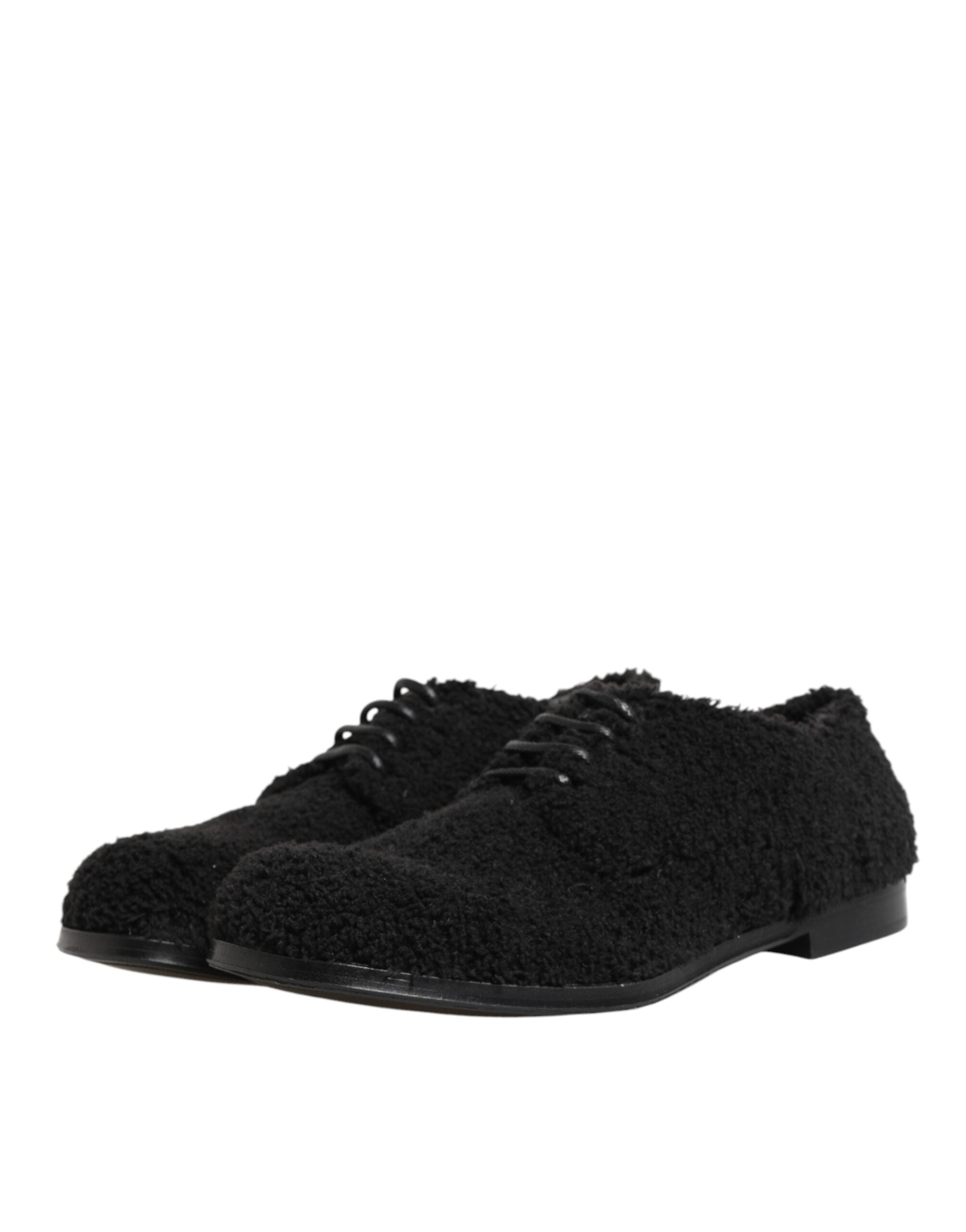 Chaussures derby Riccio en shearling noir pour homme de Dolce & Gabbana, élégantes et sophistiquées.