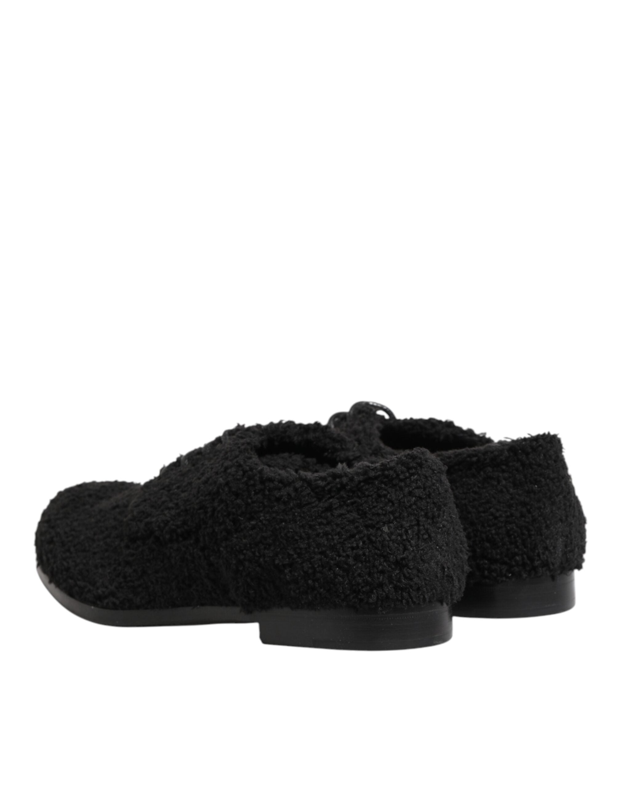 Chaussures Riccio en shearling noir pour homme de Dolce & Gabbana, derby élégantes et confortables.