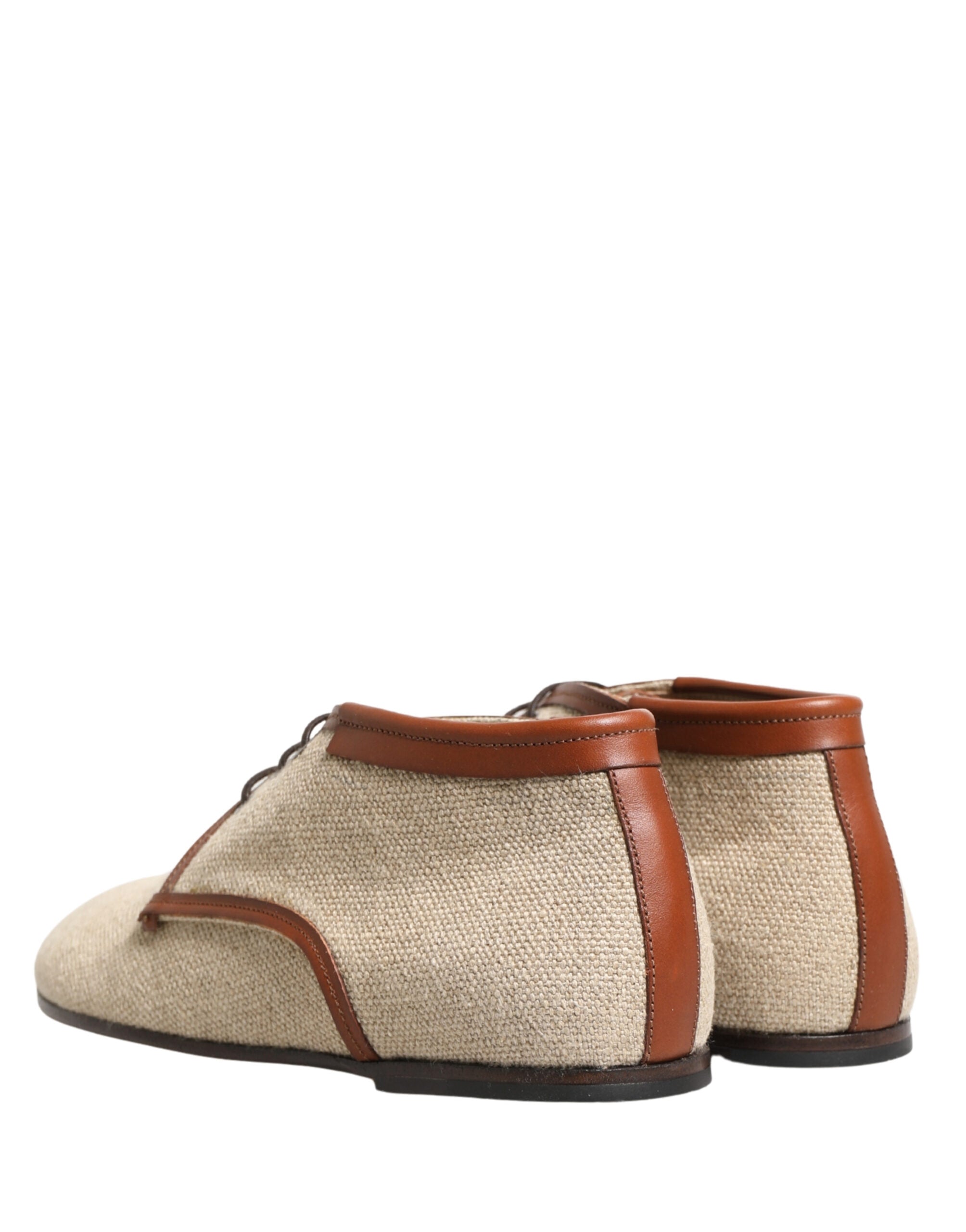 Chaussures derby hommes en toile beige Dolce & Gabbana avec lacets, élégantes et classiques pour tenue formelle.