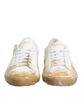 Chaussures basses en cuir blanc à effet peinture de Dolce & Gabbana, sneakers modernes avec design tendance.