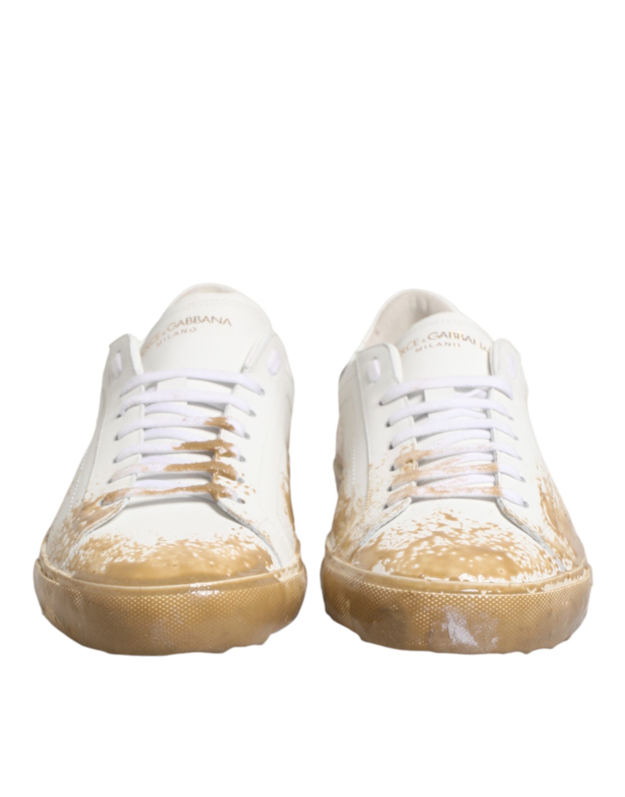 Chaussures basses en cuir blanc à effet peinture de Dolce & Gabbana, sneakers modernes avec design tendance.