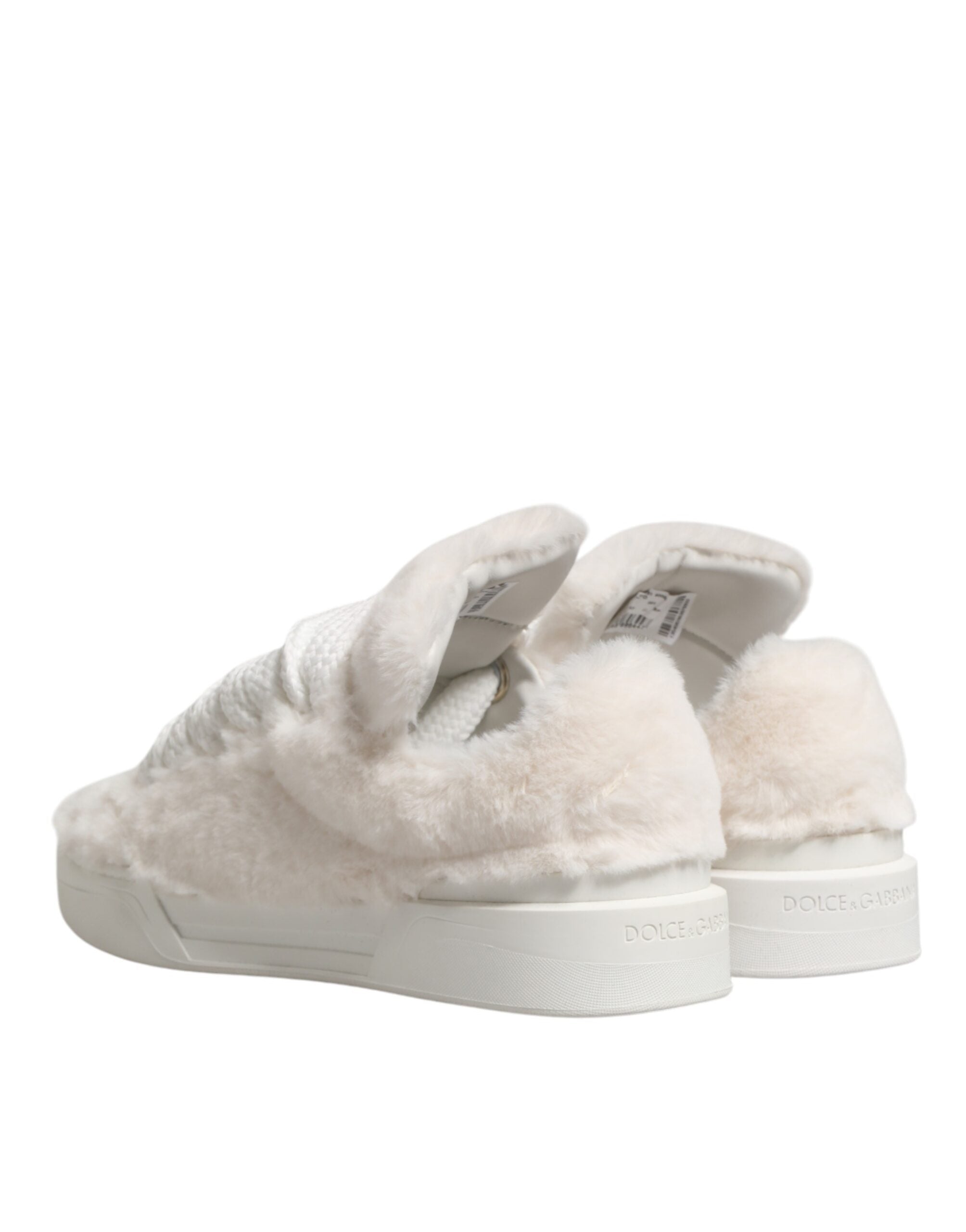 Chaussures sneakers basses blanches en shearling en fourrure bianco de Dolce & Gabbana, élégantes et confortables.