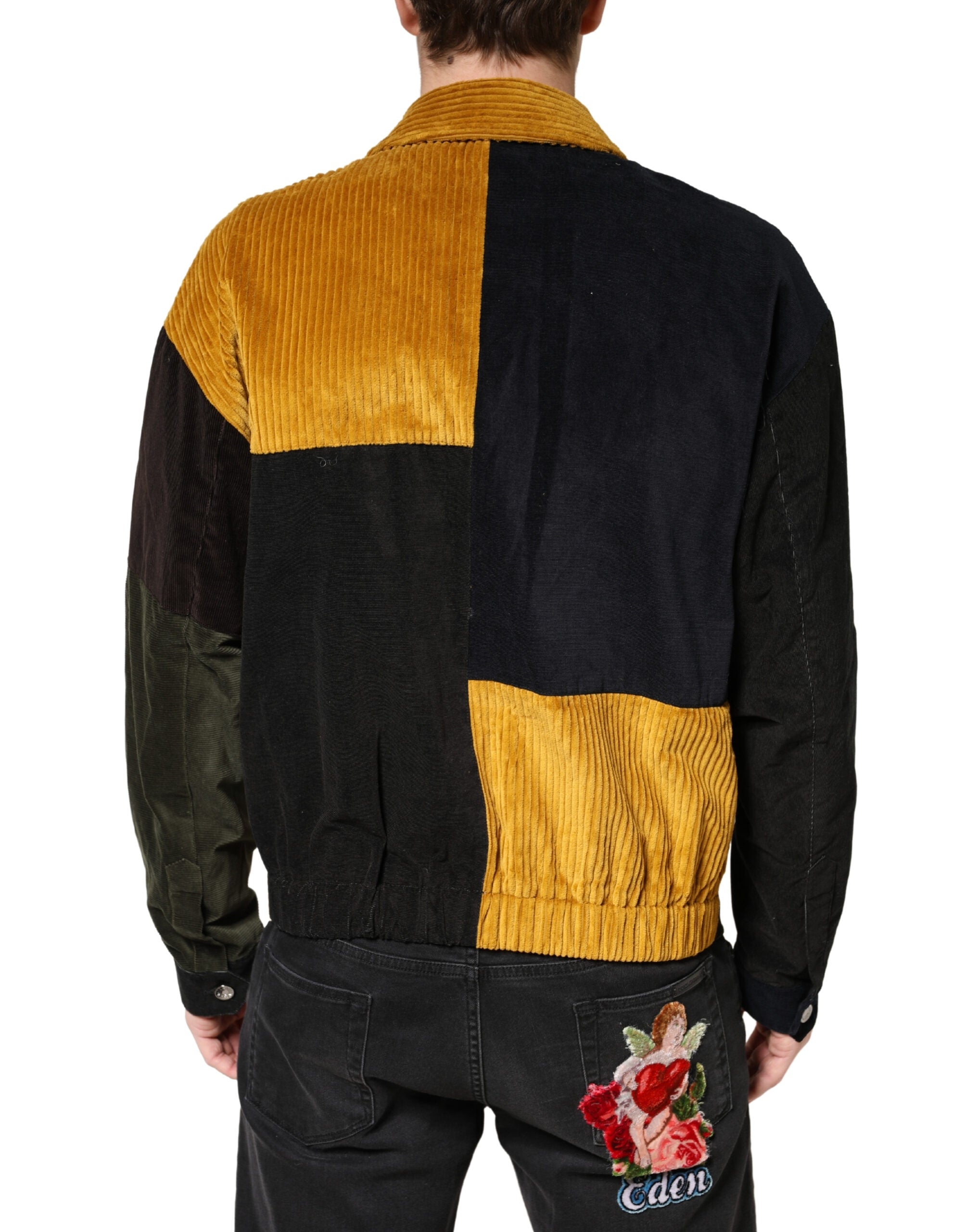 Veste en velours côtelé à patchworks multicolores Dolce & Gabbana avec écusson, style chic et original.