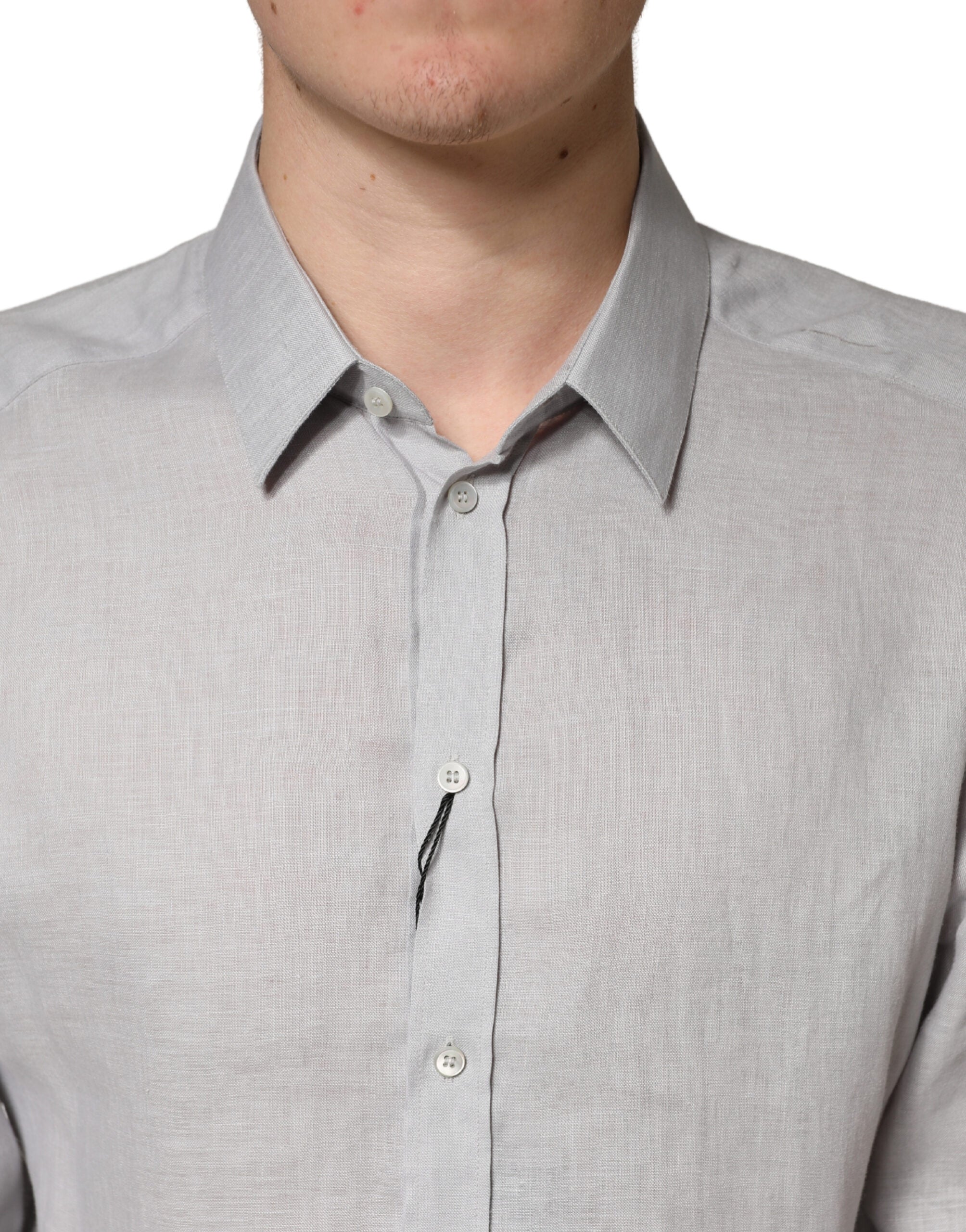 Chemise homme Dolce & Gabbana en lin gris avec manches longues et détails dorés, élégante et sophistiquée.