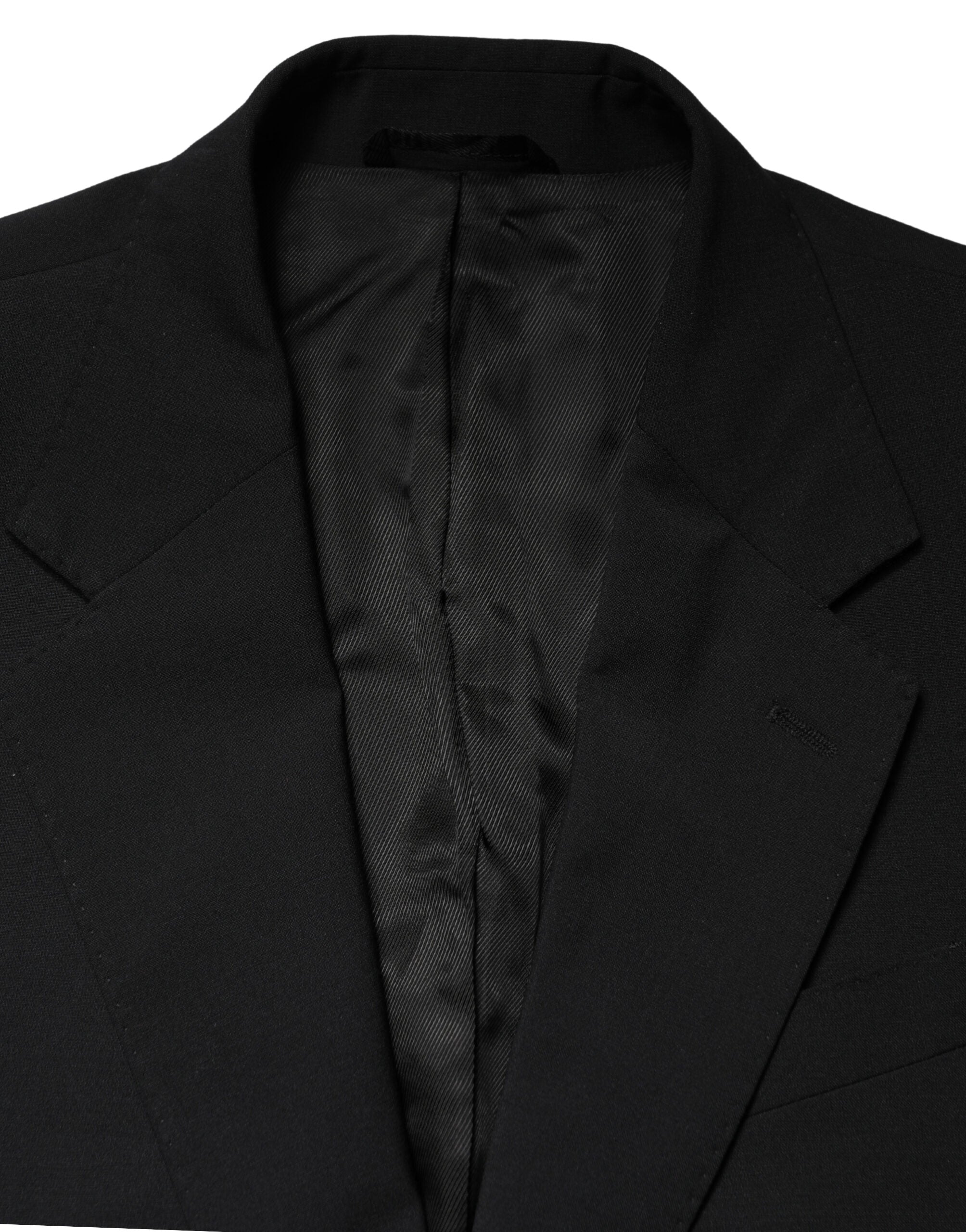 Veste de smoking noire Dolce & Gabbana MARTINI à un bouton, coupe cintrée, avec revers en satin et détails élégants.