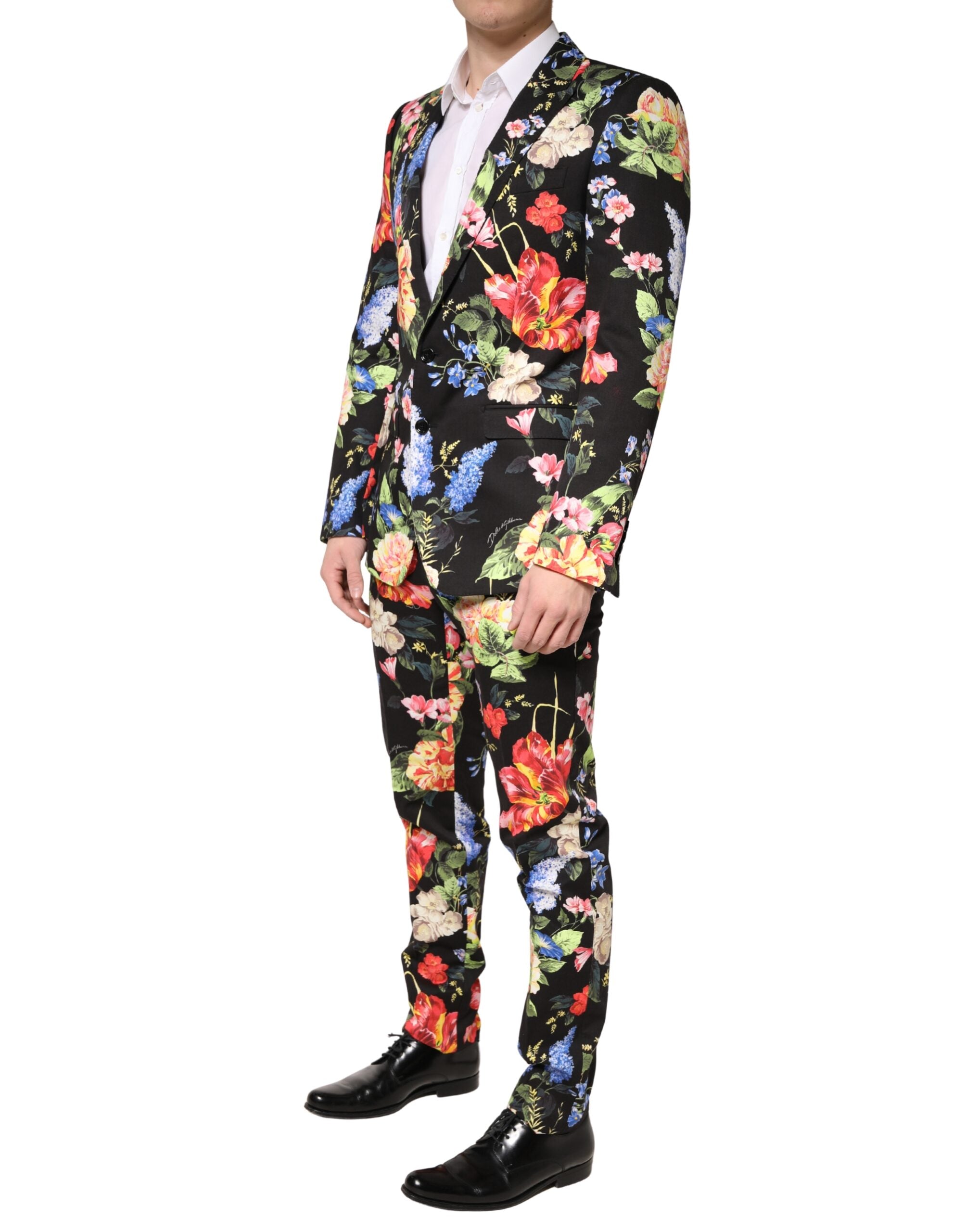 Costume noir à fleurs Dolce & Gabbana, costume deux pièces à double boutonnage, élégant et sophistiqué.