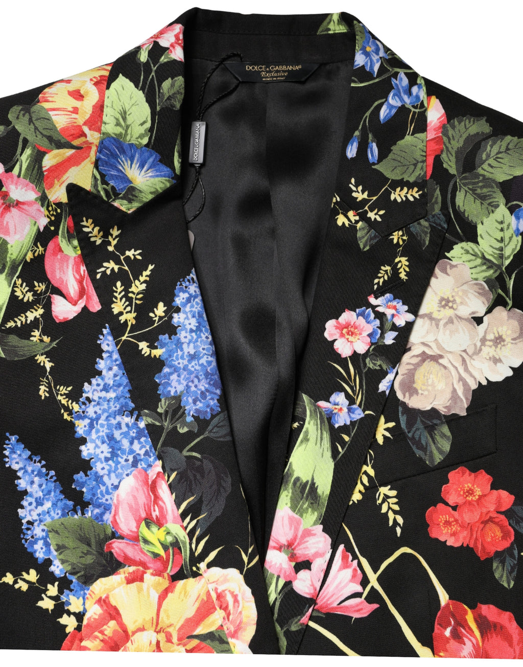 Costume deux pièces Dolce & Gabbana noir à fleurs avec veste à boutons simple breasted et pantalon élégant.