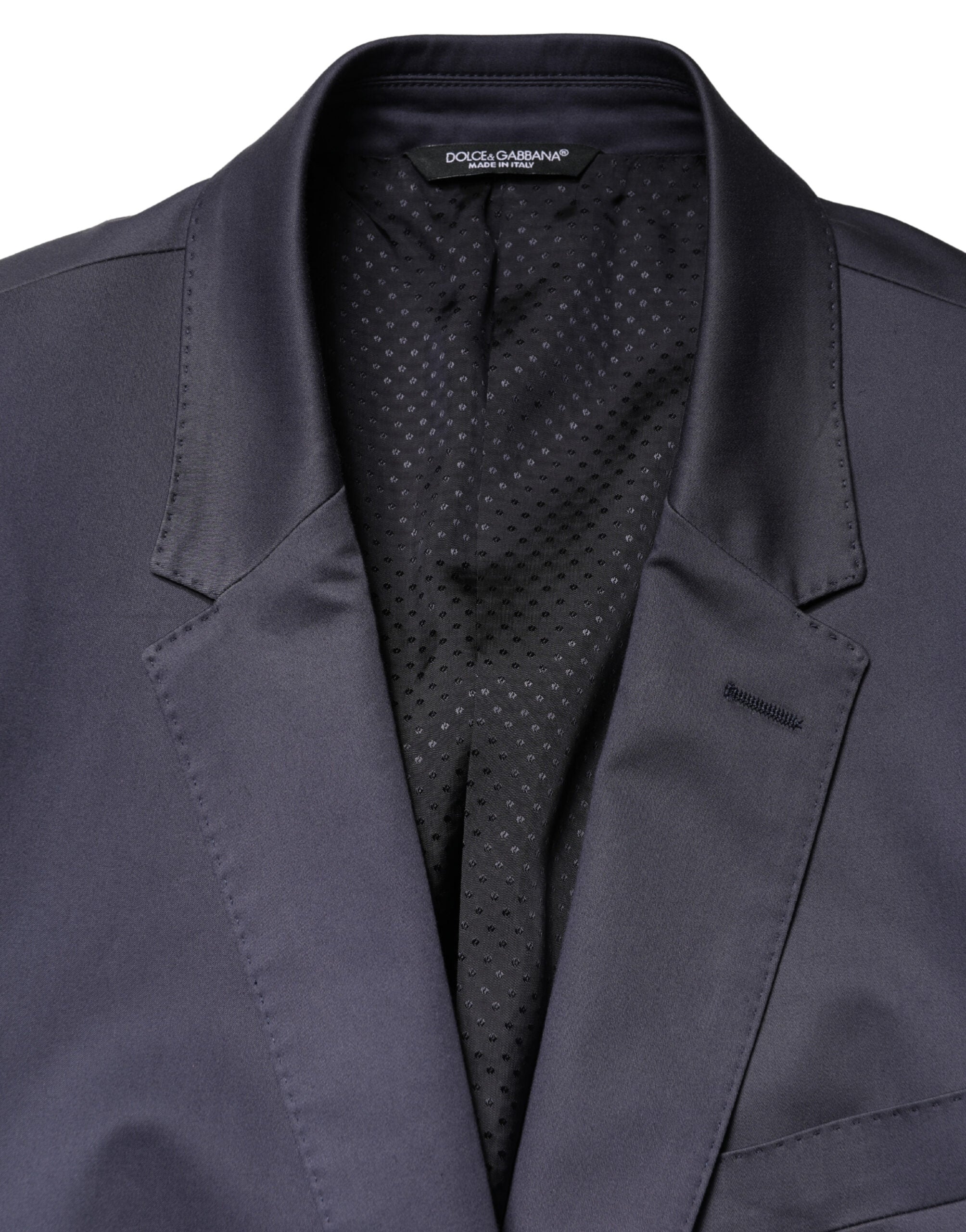 Costume homme Dolce & Gabbana bleu à deux pièces, veste à boutonnière simple et pantalon assorti, pour une allure élégante.