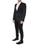 Costume homme Dolce & Gabbana en coton noir à 2 pièces, veste à double boutonnage et pantalon assorti, élégant et classique.