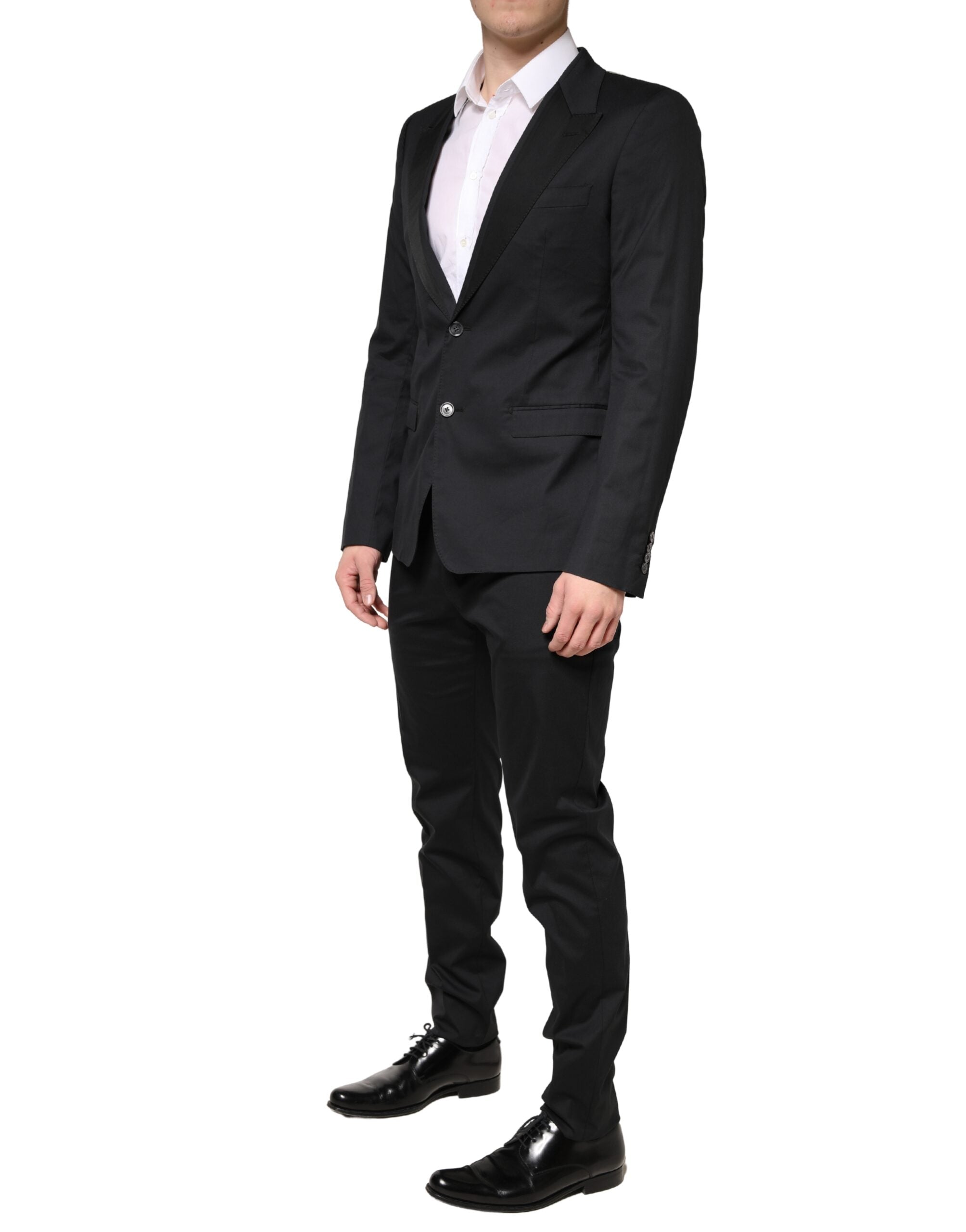 Costume homme Dolce & Gabbana en coton noir à 2 pièces, veste à double boutonnage et pantalon assorti, élégant et classique.