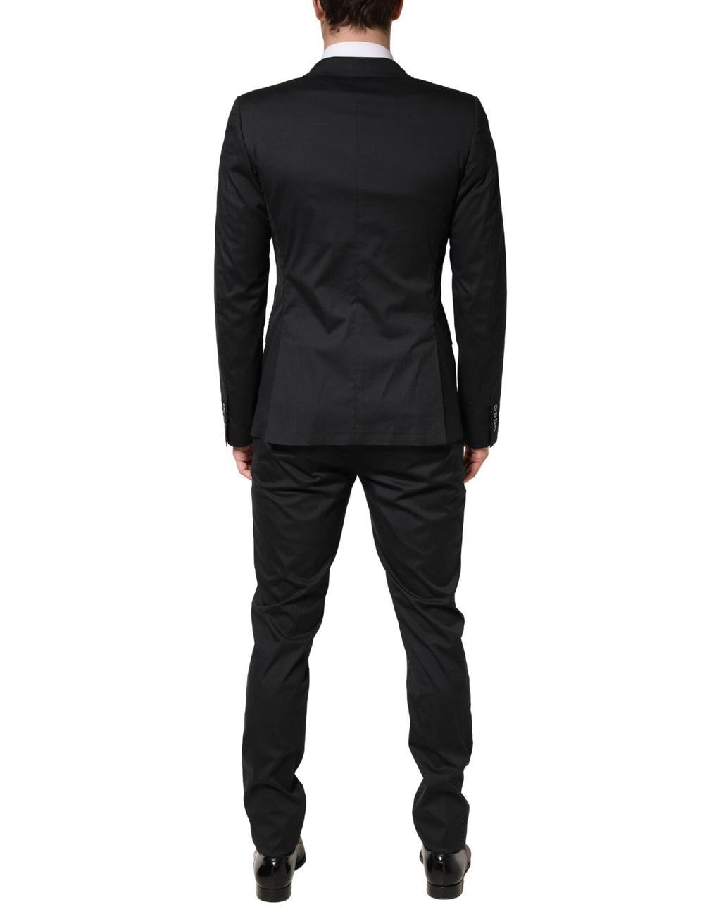 Costume deux pièces en coton noir Dolce & Gabbana, blazer à un bouton et pantalon, élégant et classique, porté sur un mannequin.