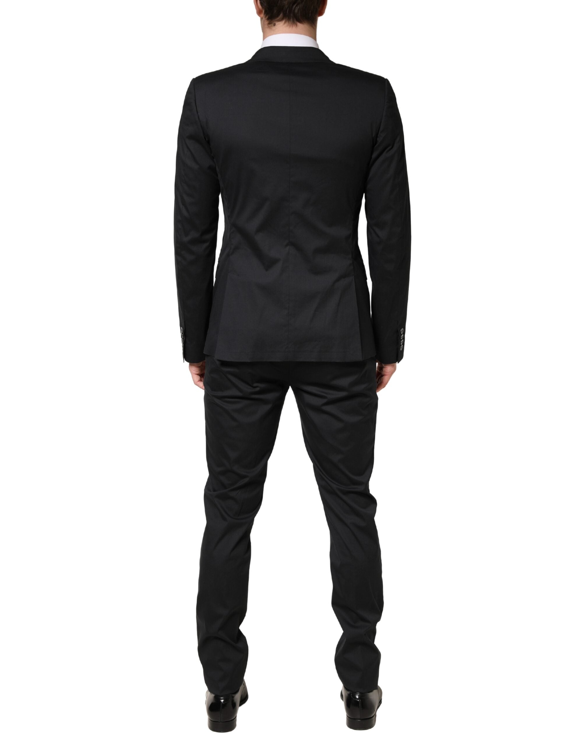 Costume deux pièces en coton noir Dolce & Gabbana, blazer à un bouton et pantalon, élégant et classique, porté sur un mannequin.
