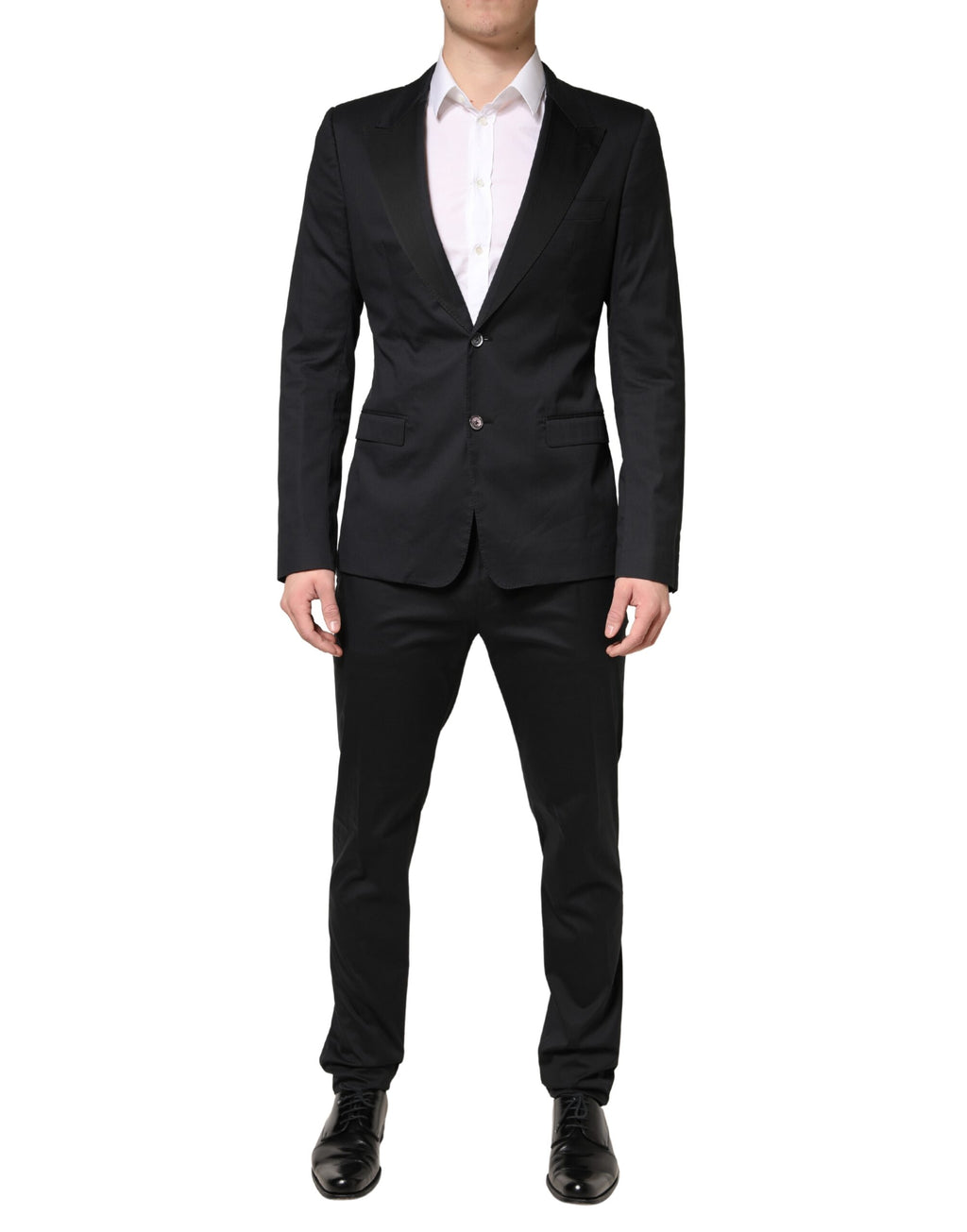 Costume homme Dolce & Gabbana en coton noir à deux pièces, veste à double boutonnage et pantalon assorti.
