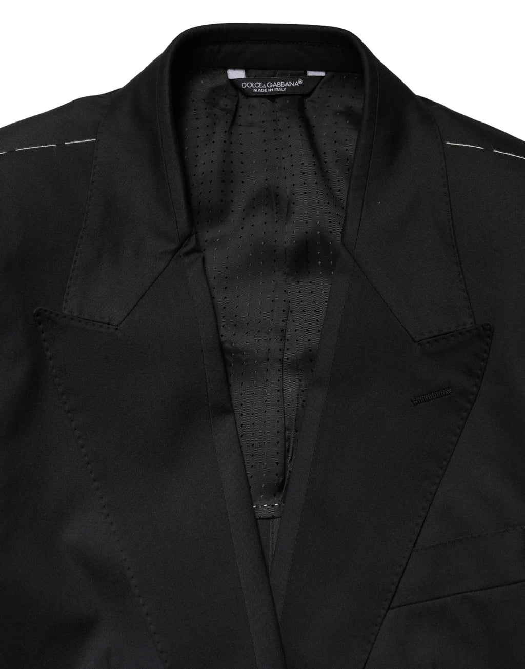 Costume deux pièces noir en coton de Dolce & Gabbana, veste croisée à simple boutonnage et pantalon assorti.