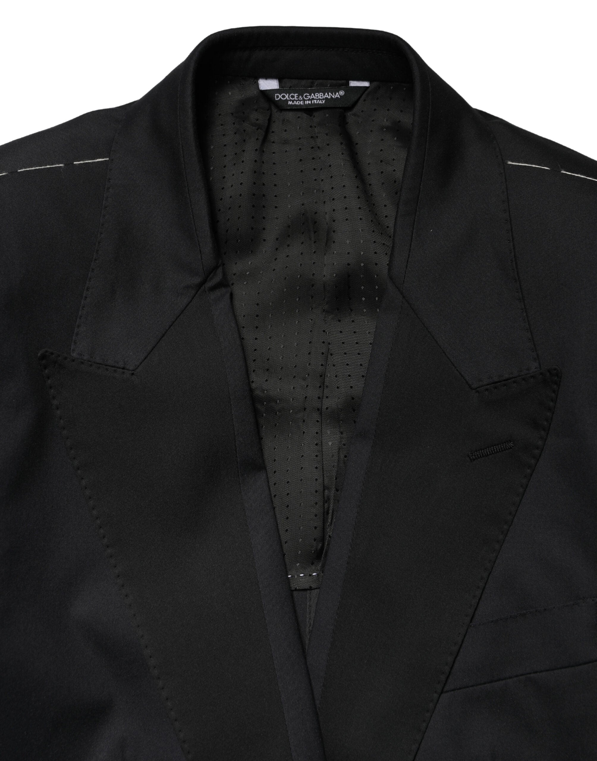 Costume deux pièces noir en coton de Dolce & Gabbana, veste croisée à simple boutonnage et pantalon assorti.