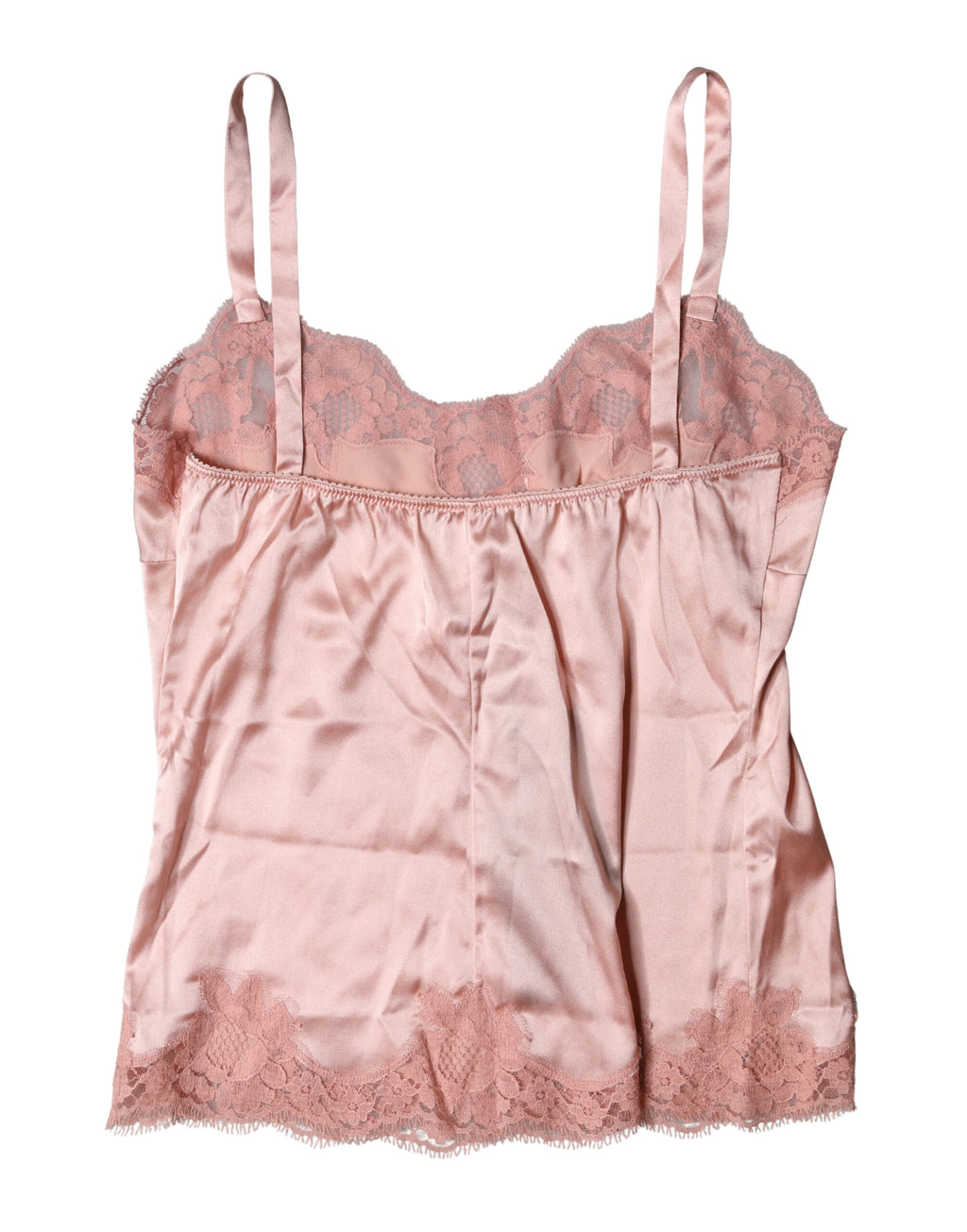 Top de lingerie en dentelle florale rose clair de Dolce & Gabbana, élégant et féminin, visible en détail dans l'image.