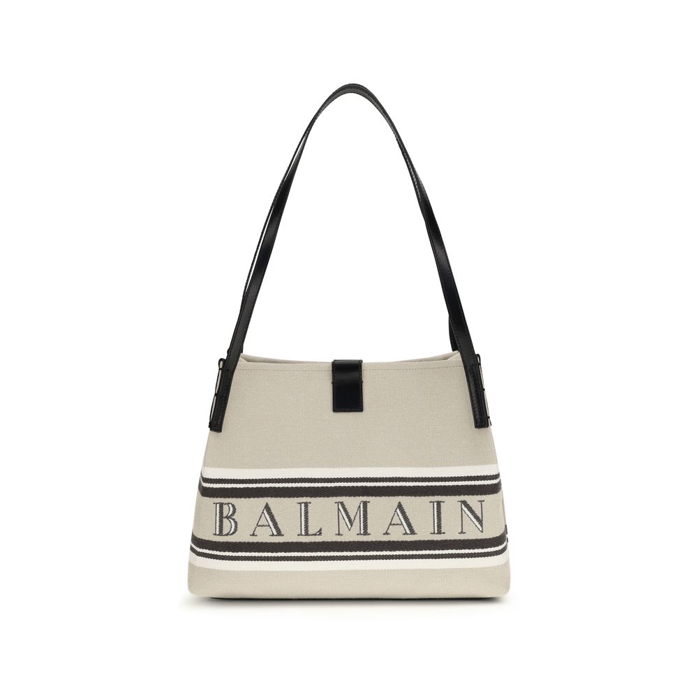 Sac à main beige en coton de Balmain, sac d'épaule élégant avec détails sophistiqués visible sur l'image.