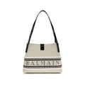 Sac à main beige en coton de Balmain, sac d'épaule élégant avec détails sophistiqués visible sur l'image.