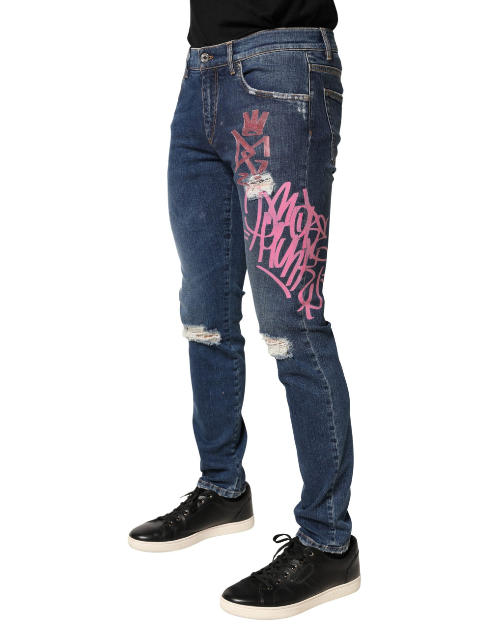 Jeans skinny Dolce & Gabbana bleu avec motif graffiti déchiré et usé, style streetwear tendance.