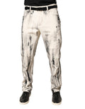 Jeans décontractés en denim blanc Dolce & Gabbana avec motif peinture délavée, coupe ample et style tendance.