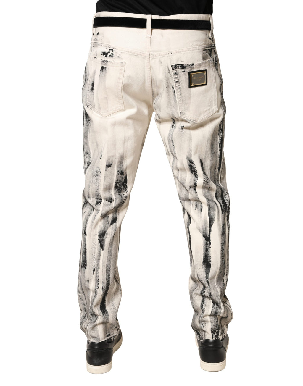 Jeans décontractés blanc à motif peinture délavée de Dolce & Gabbana, style loose en denim usé.