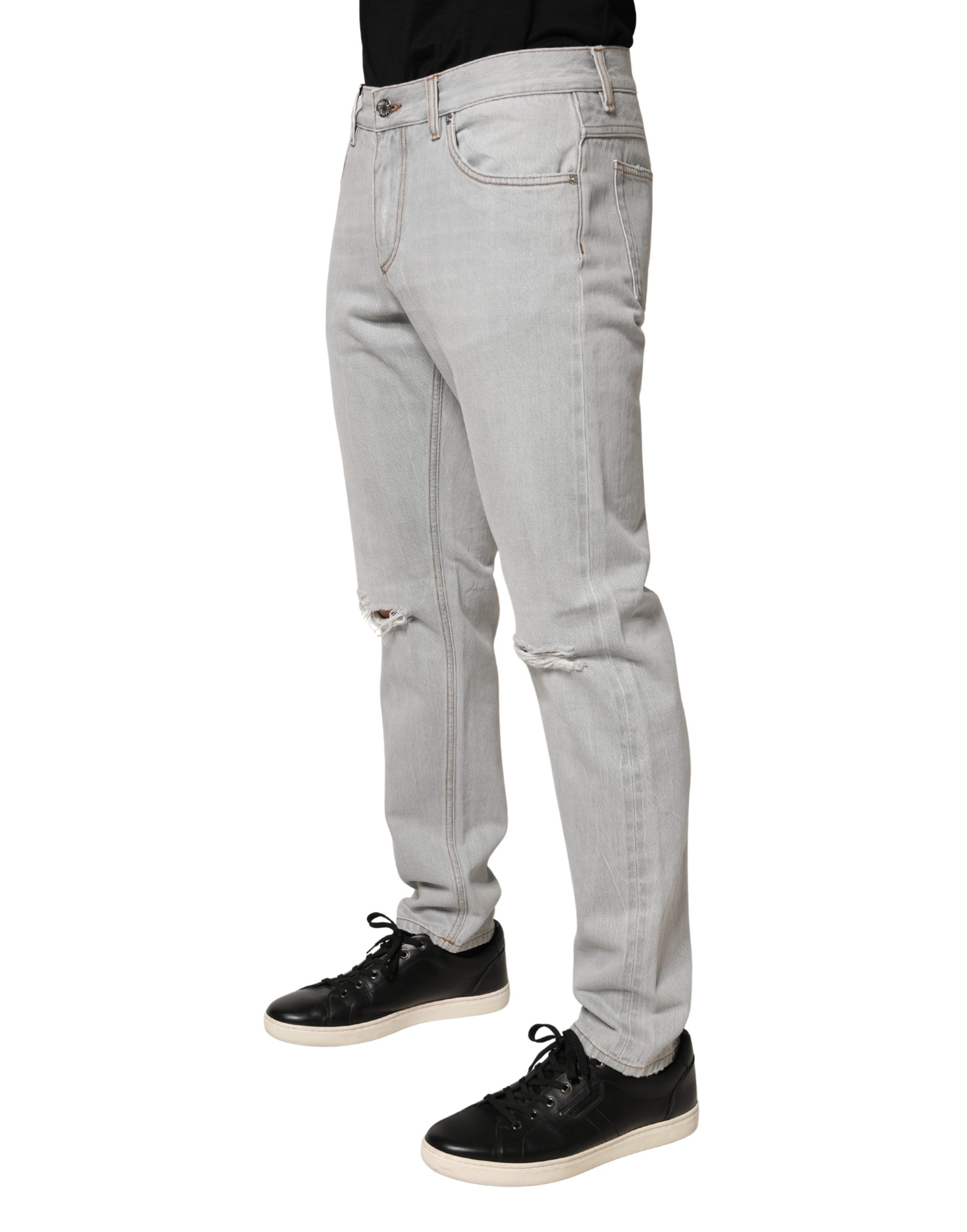 Jeans en jean en coton gris clair déchiré de Dolce & Gabbana, coupe régulière et style décontracté.