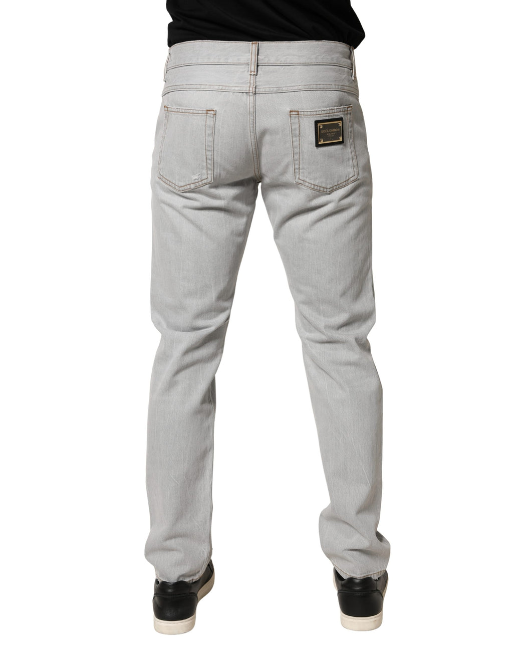 Jeans en coton gris clair déchirés de Dolce & Gabbana, coupe régulière et style décontracté.