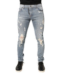 Jeans skinny déchirés pour homme Dolce & Gabbana Light Blue, denim bleu clair avec détails usés et coupe ajustée.