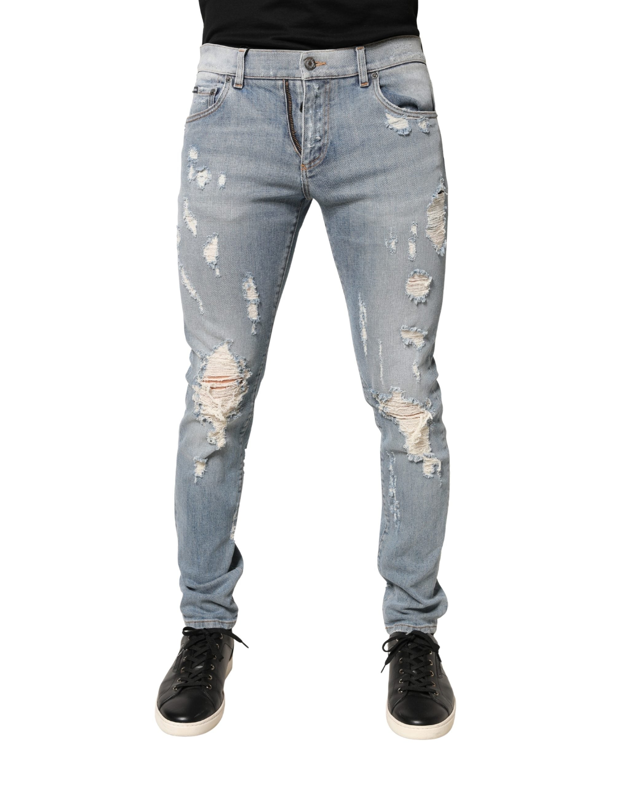 Jeans skinny déchirés pour homme Dolce & Gabbana Light Blue, denim bleu clair avec détails usés et coupe ajustée.