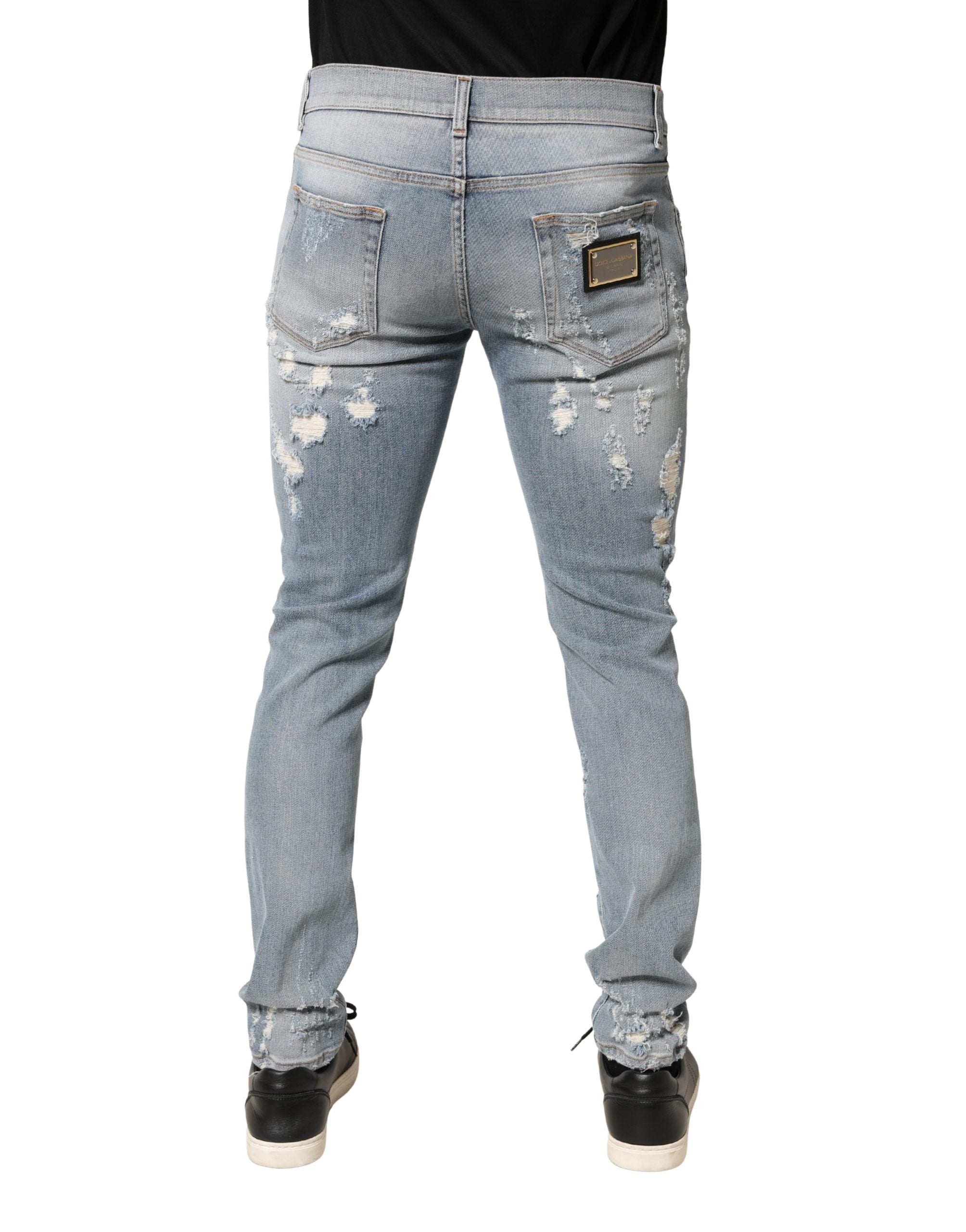Jeans skinny déchirés pour homme Dolce & Gabbana Light Blue en denim, style décontracté et tendance.