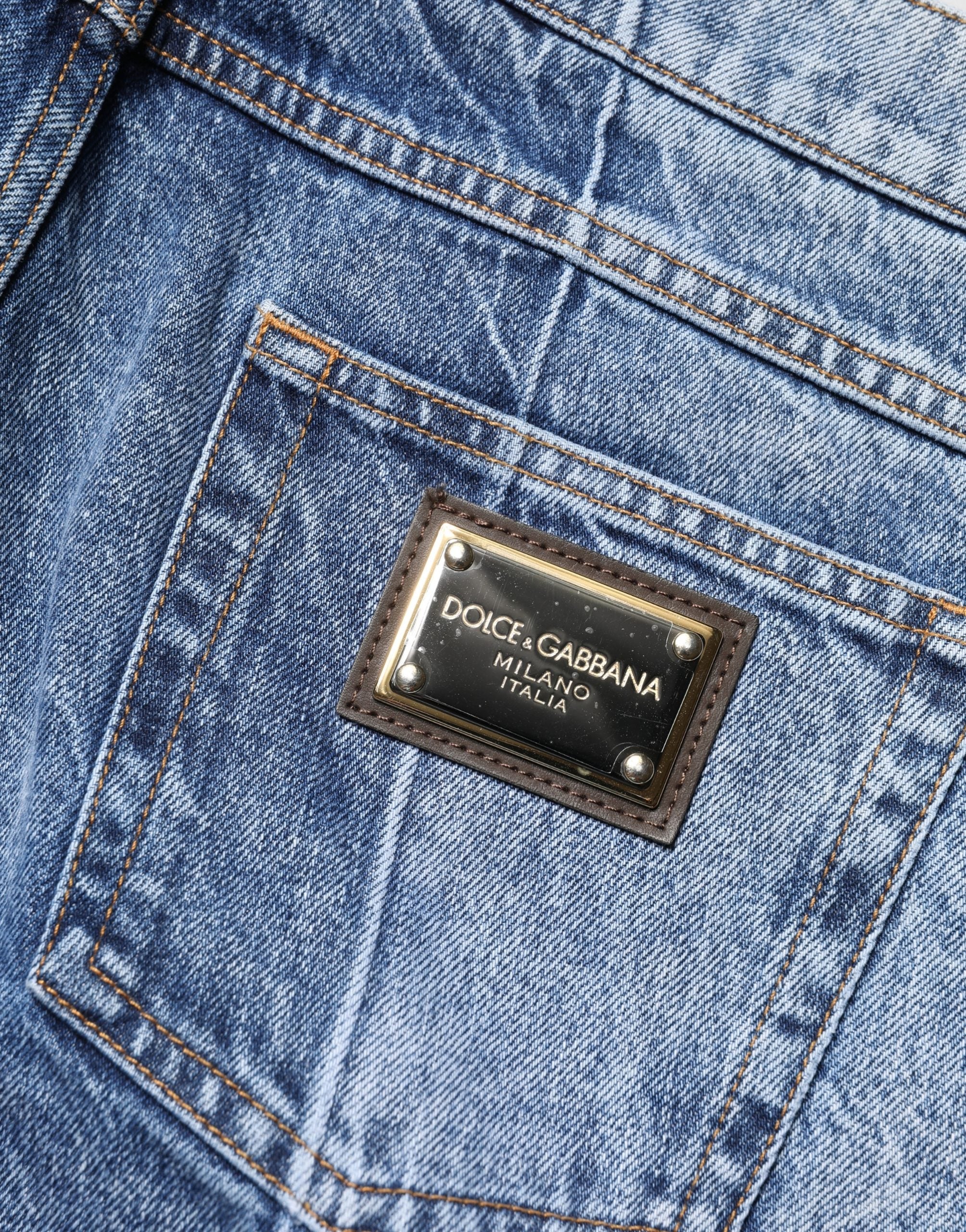Jeans homme en denim bleu à deux tons Dolce & Gabbana, coupe régulière, en coton, mode élégante et confortable.