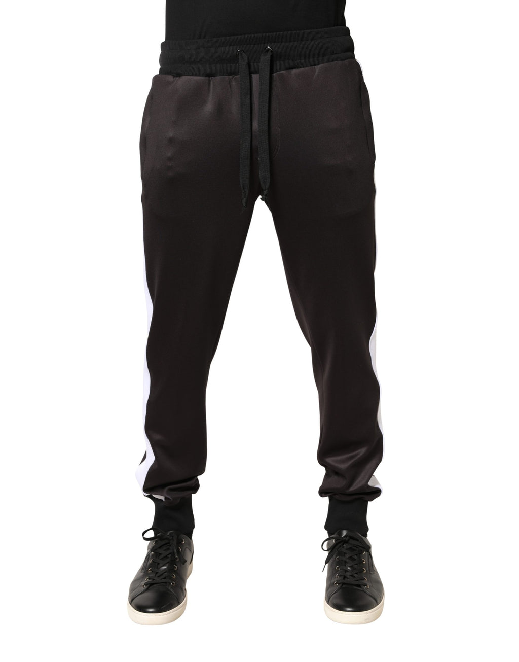 Pantalon jogger skinny en polyester marron de Dolce & Gabbana, style décontracté et ajusté, visible sur l'image.