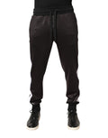 Pantalon jogger skinny en polyester marron de Dolce & Gabbana, style décontracté et ajusté, visible sur l'image.